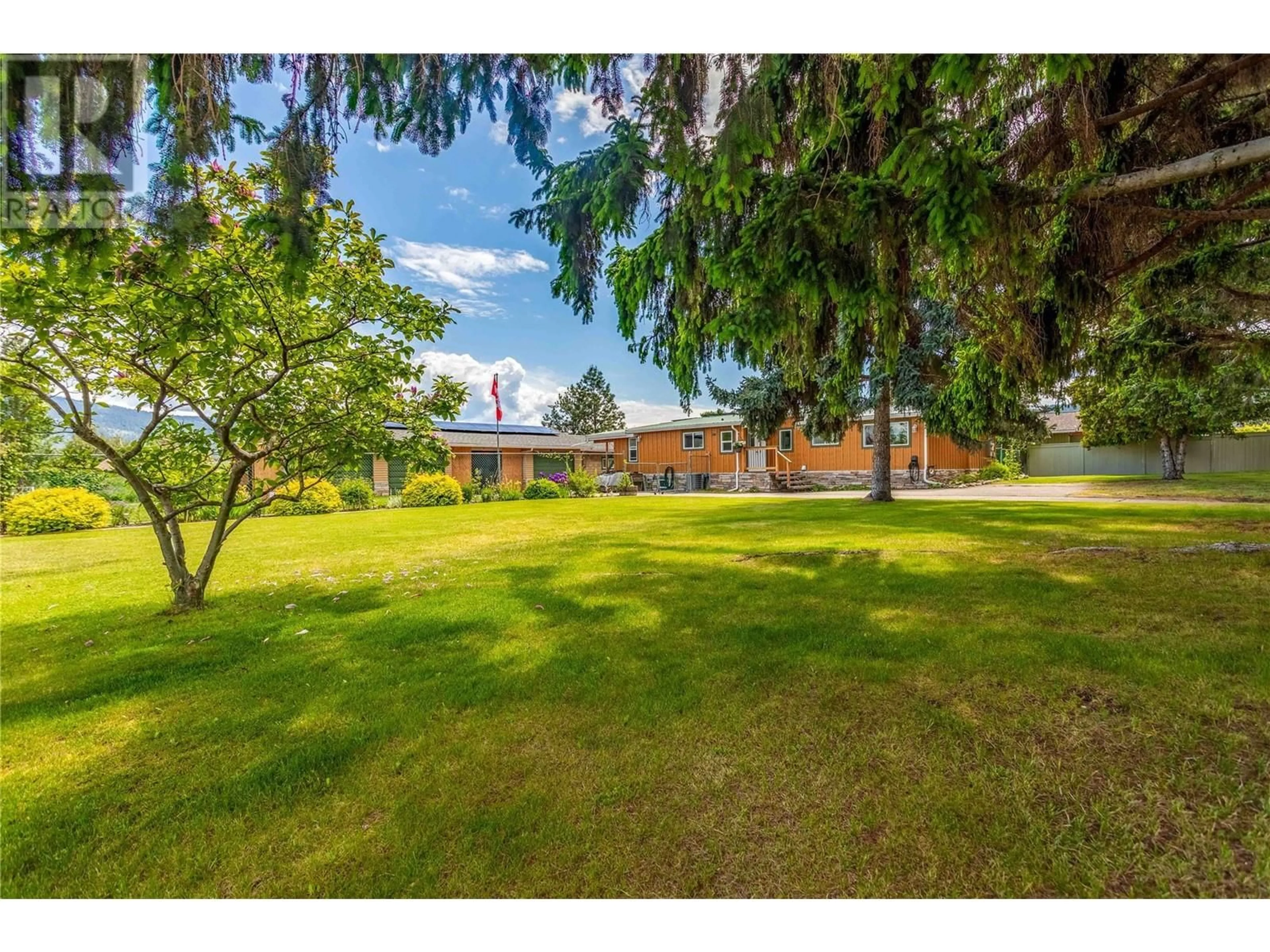 A pic from outside/outdoor area/front of a property/back of a property/a pic from drone, mountain view for 7281 FINTRY DELTA ROAD, Fintry British Columbia V1Z3V1