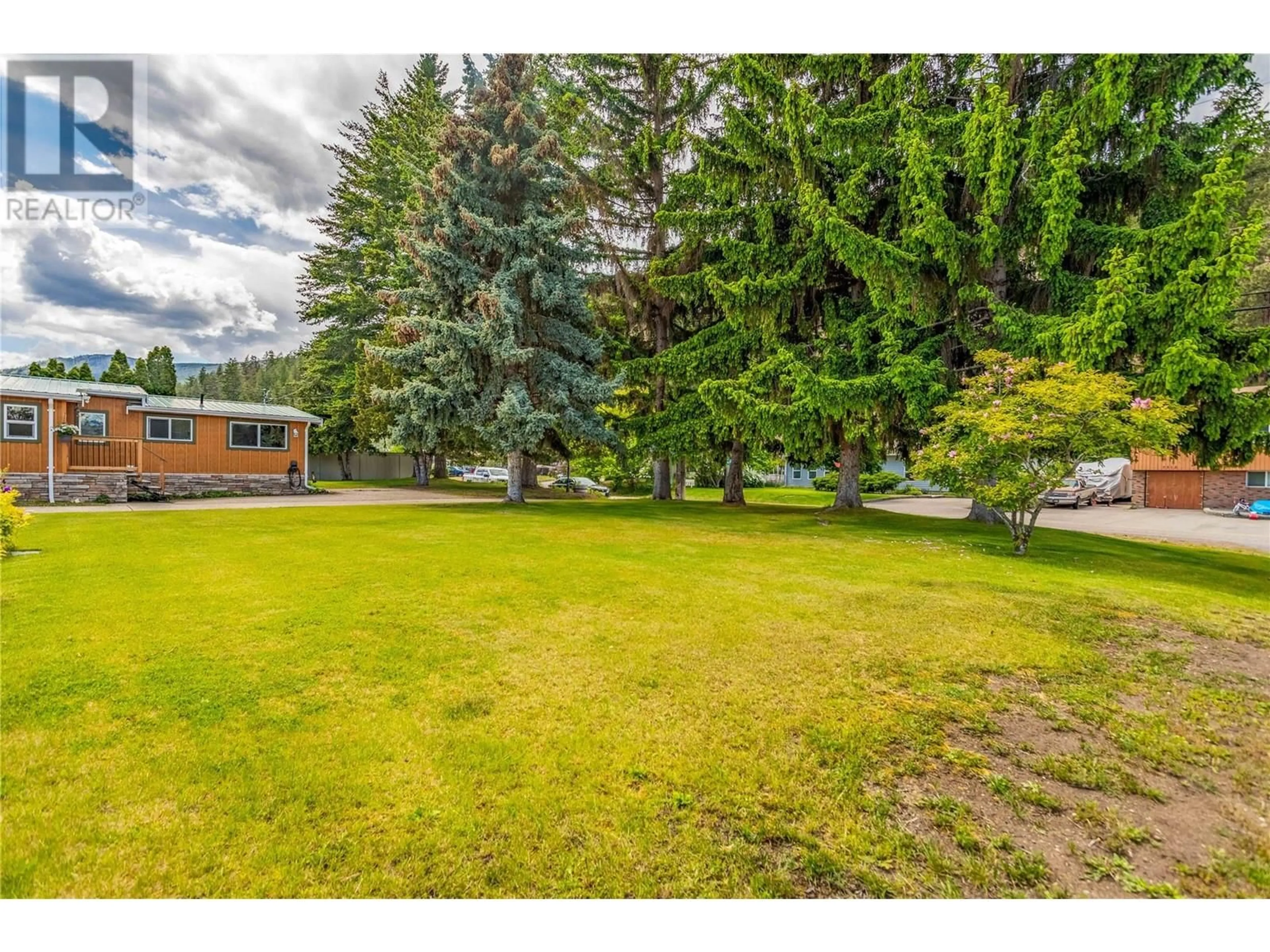 A pic from outside/outdoor area/front of a property/back of a property/a pic from drone, unknown for 7281 FINTRY DELTA ROAD, Fintry British Columbia V1Z3V1