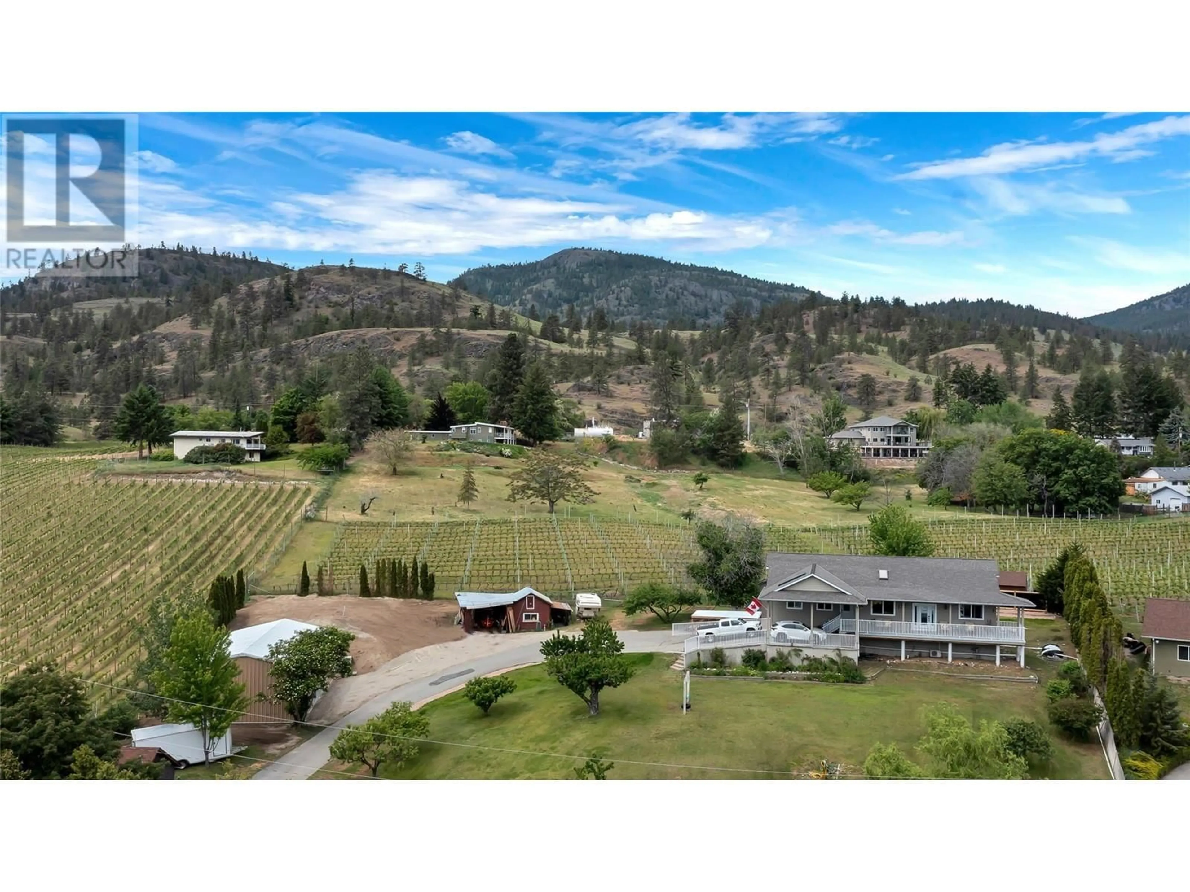 A pic from outside/outdoor area/front of a property/back of a property/a pic from drone, mountain view for 203 JUNIPER AVENUE, Kaleden British Columbia V0H1K0