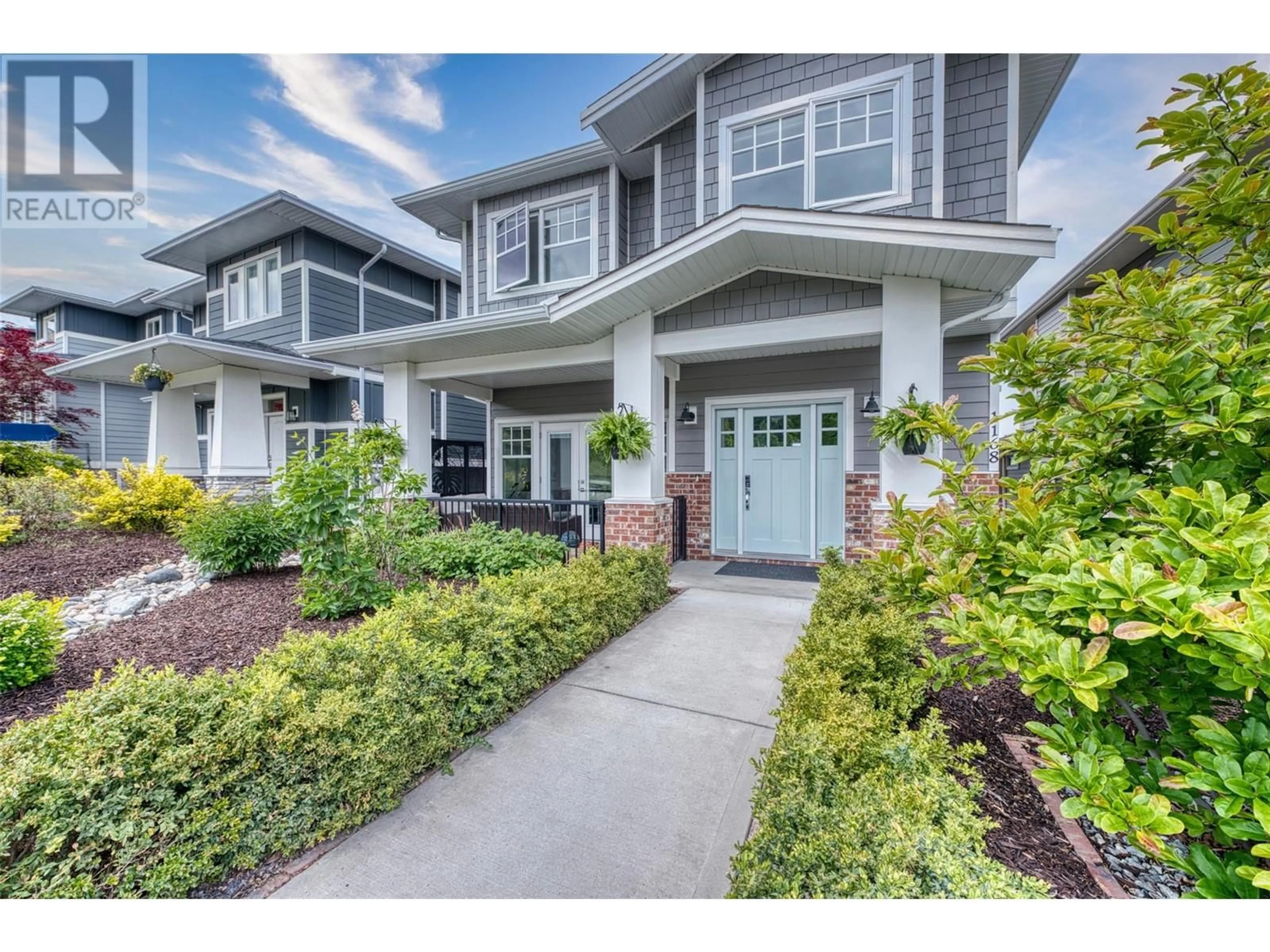 Home with vinyl exterior material, street for 1168 FROST ROAD, Kelowna British Columbia V1W5M1