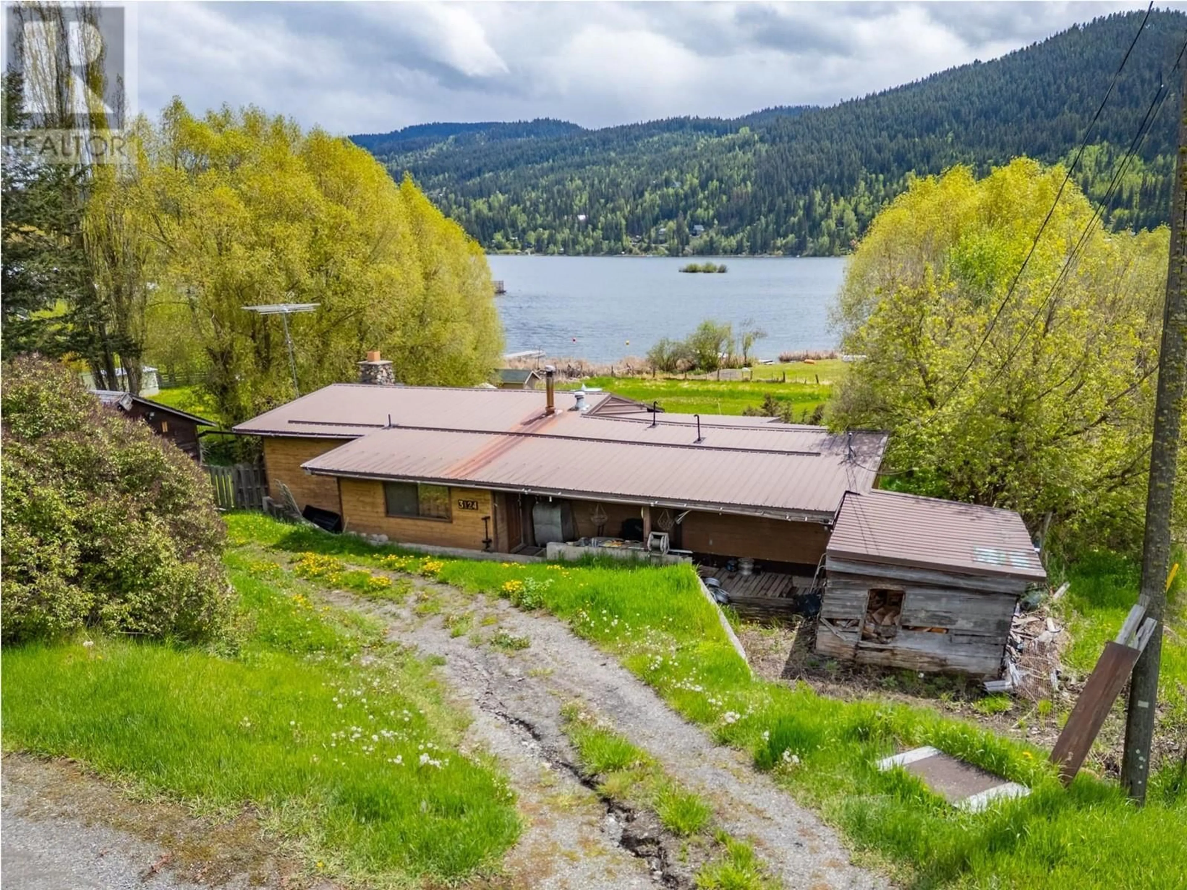 A pic from outside/outdoor area/front of a property/back of a property/a pic from drone, water/lake/river/ocean view for 3124 HOLBROOK ROAD, Kamloops British Columbia v0e3e1
