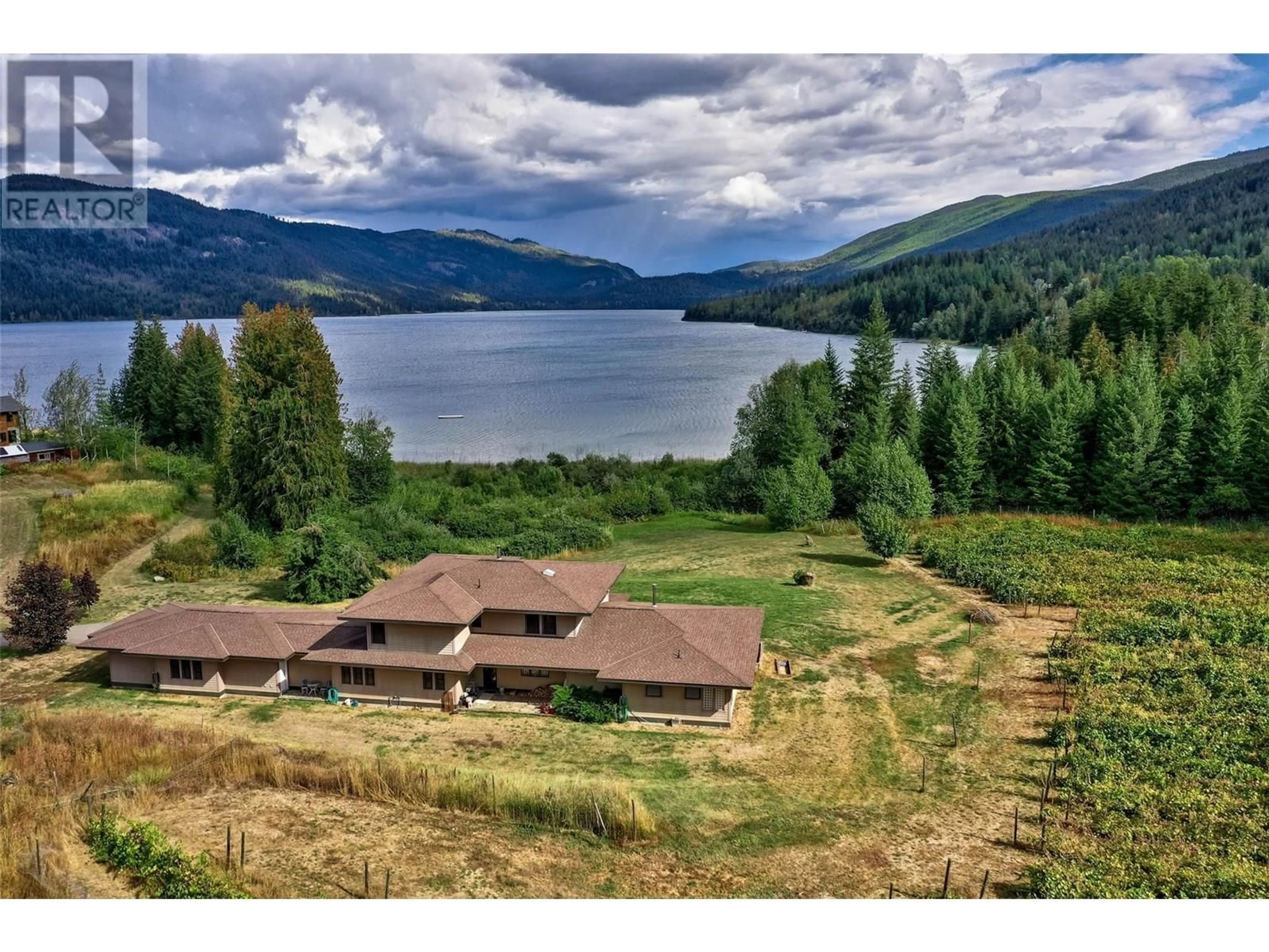 A pic from outside/outdoor area/front of a property/back of a property/a pic from drone, water/lake/river/ocean view for 3832 PAKKA ROAD, White Lake British Columbia V0E2W1