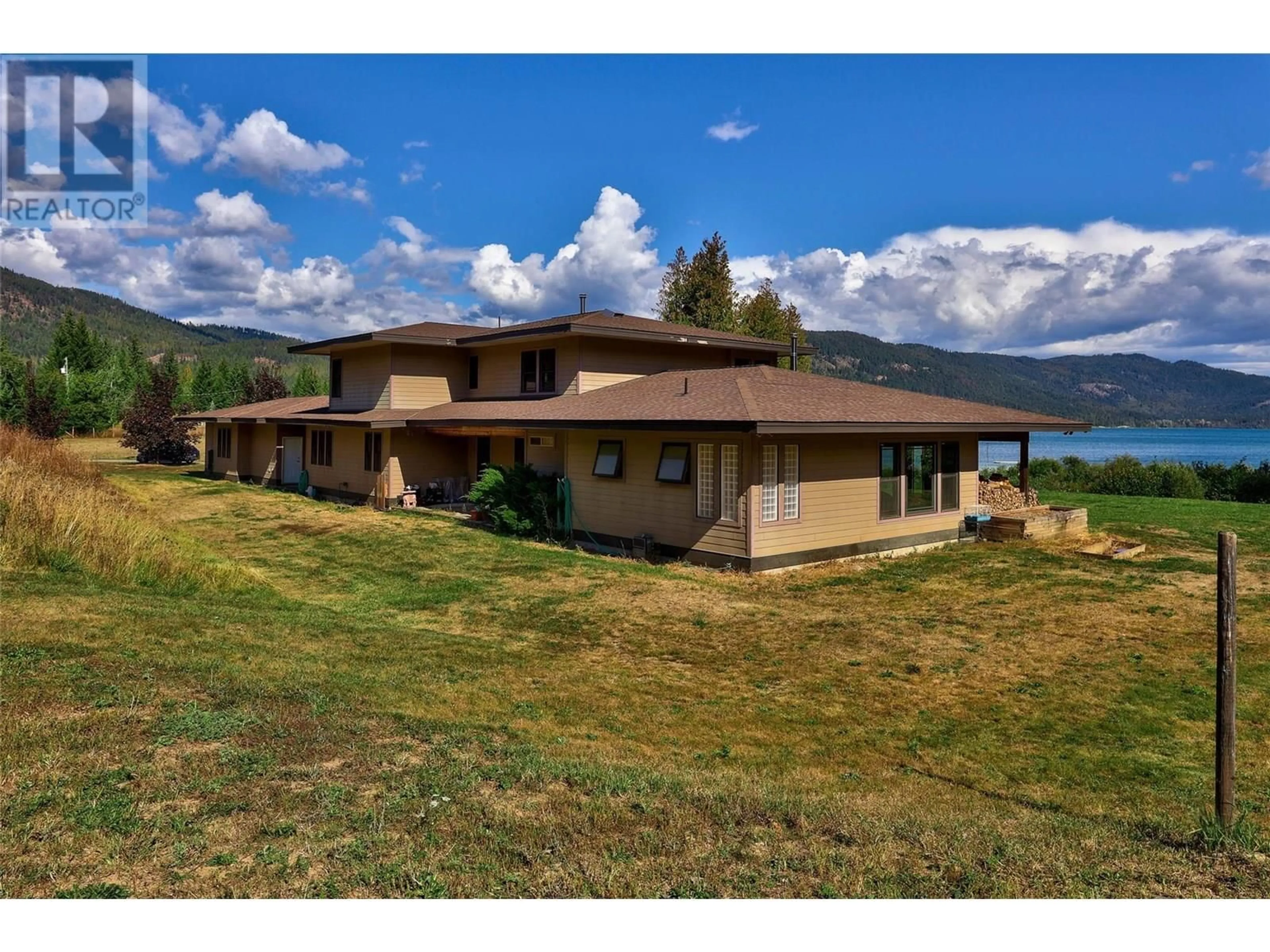 A pic from outside/outdoor area/front of a property/back of a property/a pic from drone, water/lake/river/ocean view for 3832 PAKKA ROAD, White Lake British Columbia V0E2W1