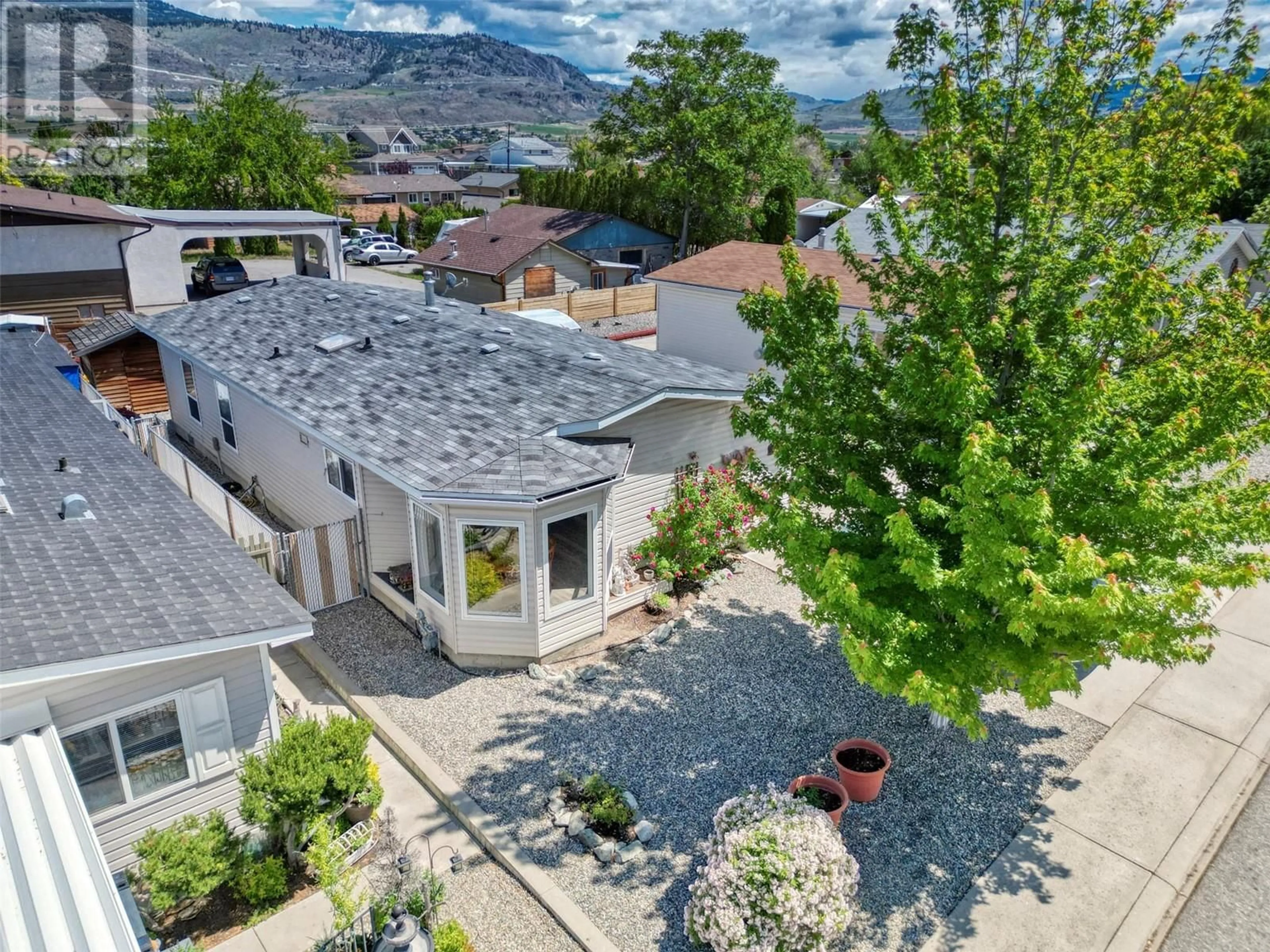 A pic from outside/outdoor area/front of a property/back of a property/a pic from drone, mountain view for 4 - 30 CACTUS CRESCENT, Osoyoos British Columbia V0H1V1
