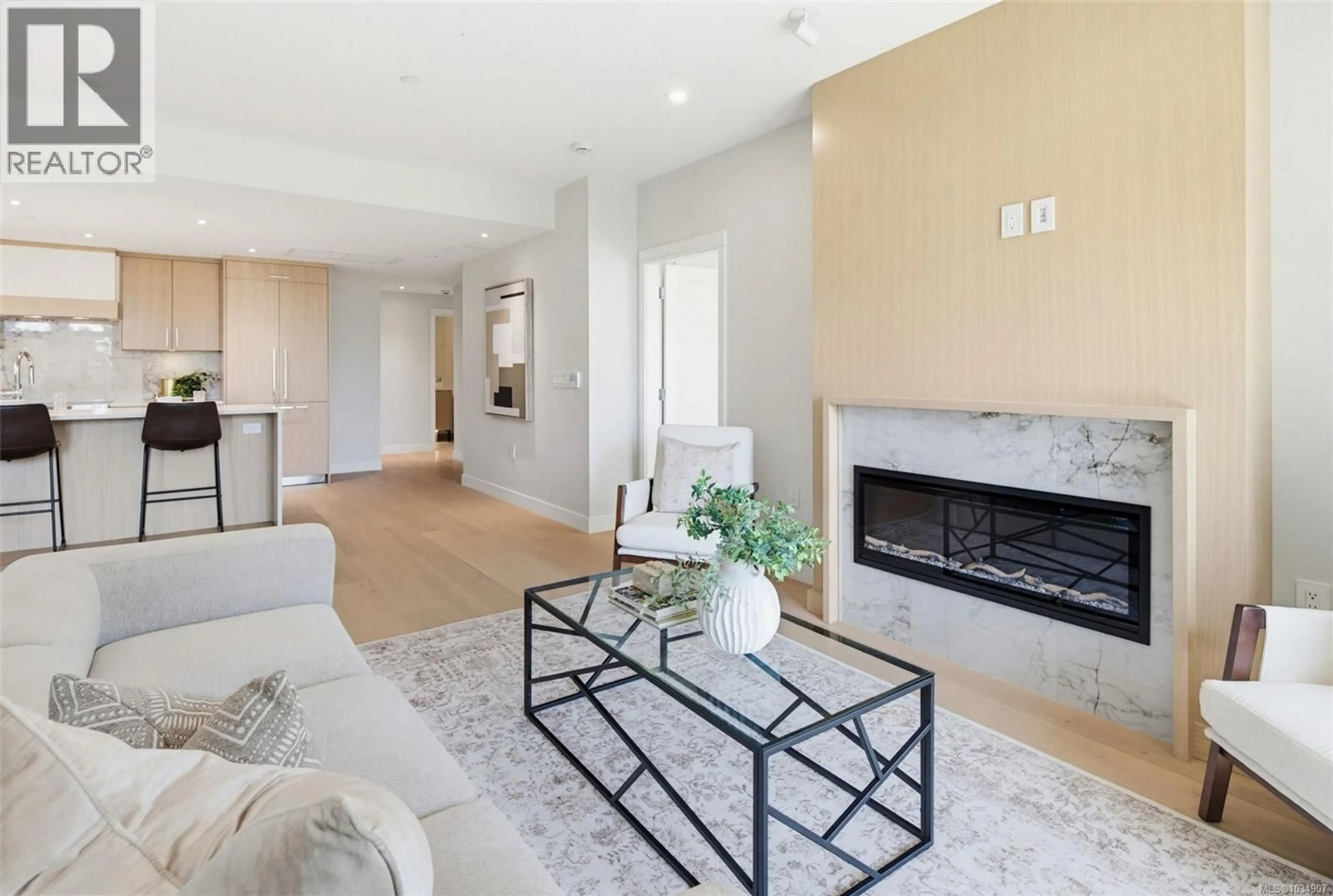 Living room with furniture, unknown for 202 - 5229 CORDOVA BAY ROAD, Saanich British Columbia V8Y2L1