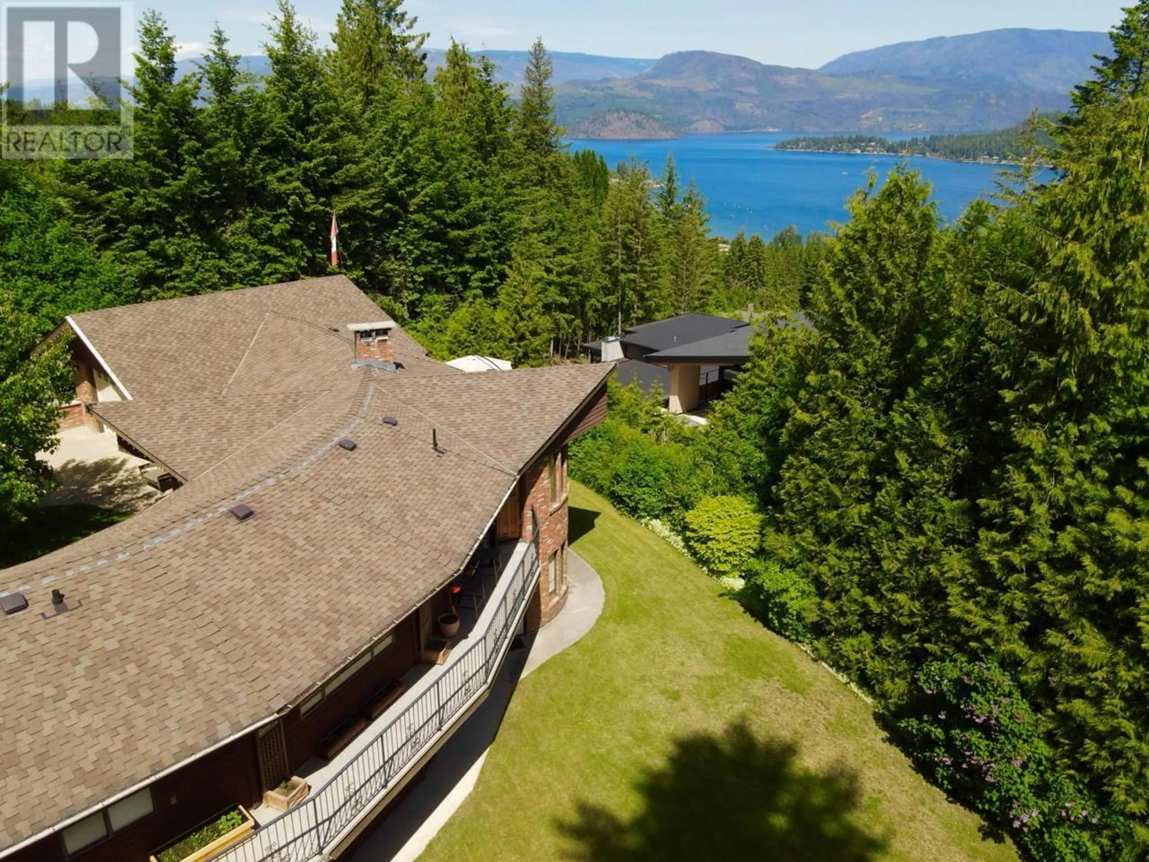 A pic from outside/outdoor area/front of a property/back of a property/a pic from drone, water/lake/river/ocean view for 2631 GRANDVIEW PLACE, Blind Bay British Columbia V0E1H2