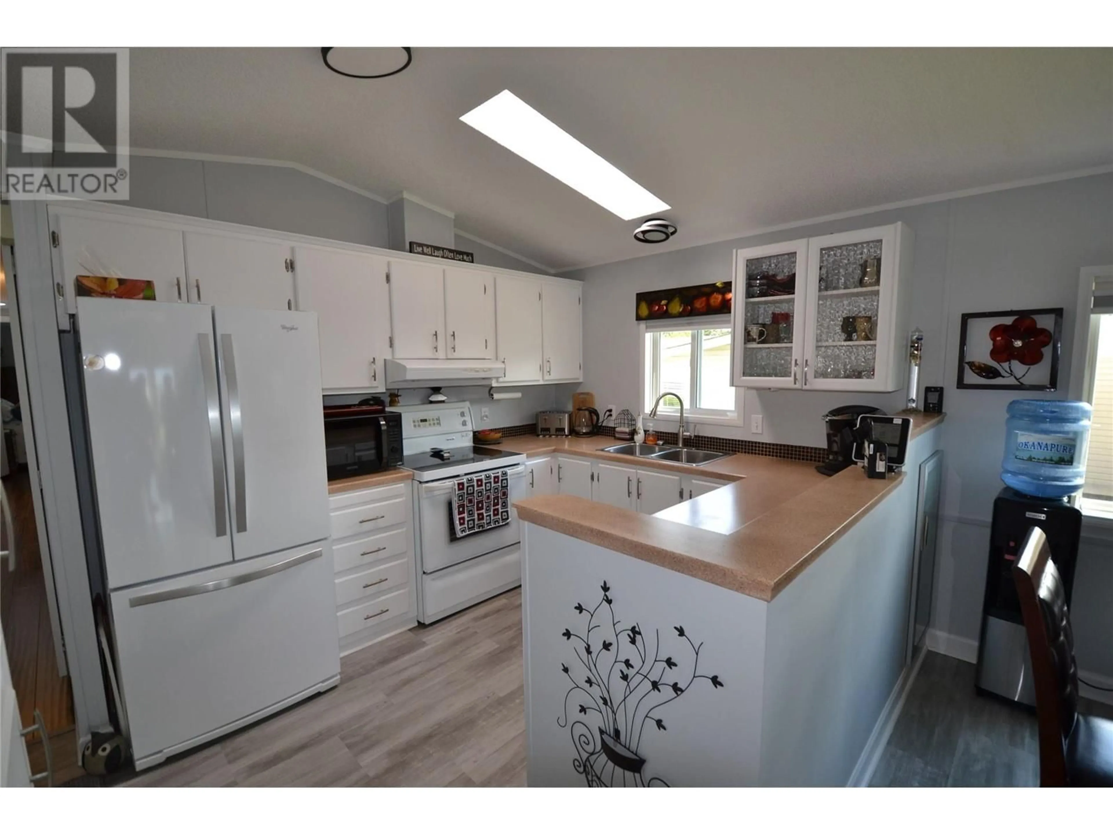 Open concept kitchen, wood/laminate floor for 61 - 1850 SHANNON LAKE ROAD, West Kelowna British Columbia V4T1L2