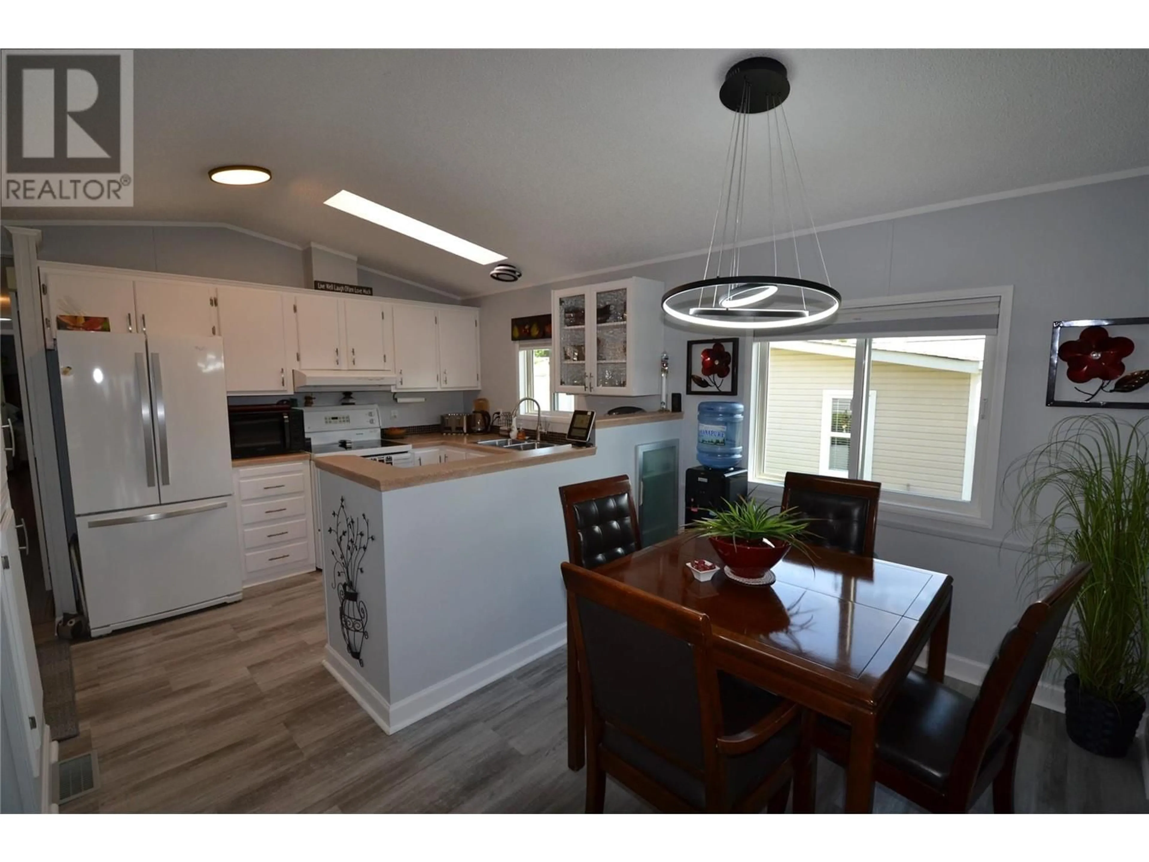 Open concept kitchen, wood/laminate floor for 61 - 1850 SHANNON LAKE ROAD, West Kelowna British Columbia V4T1L2