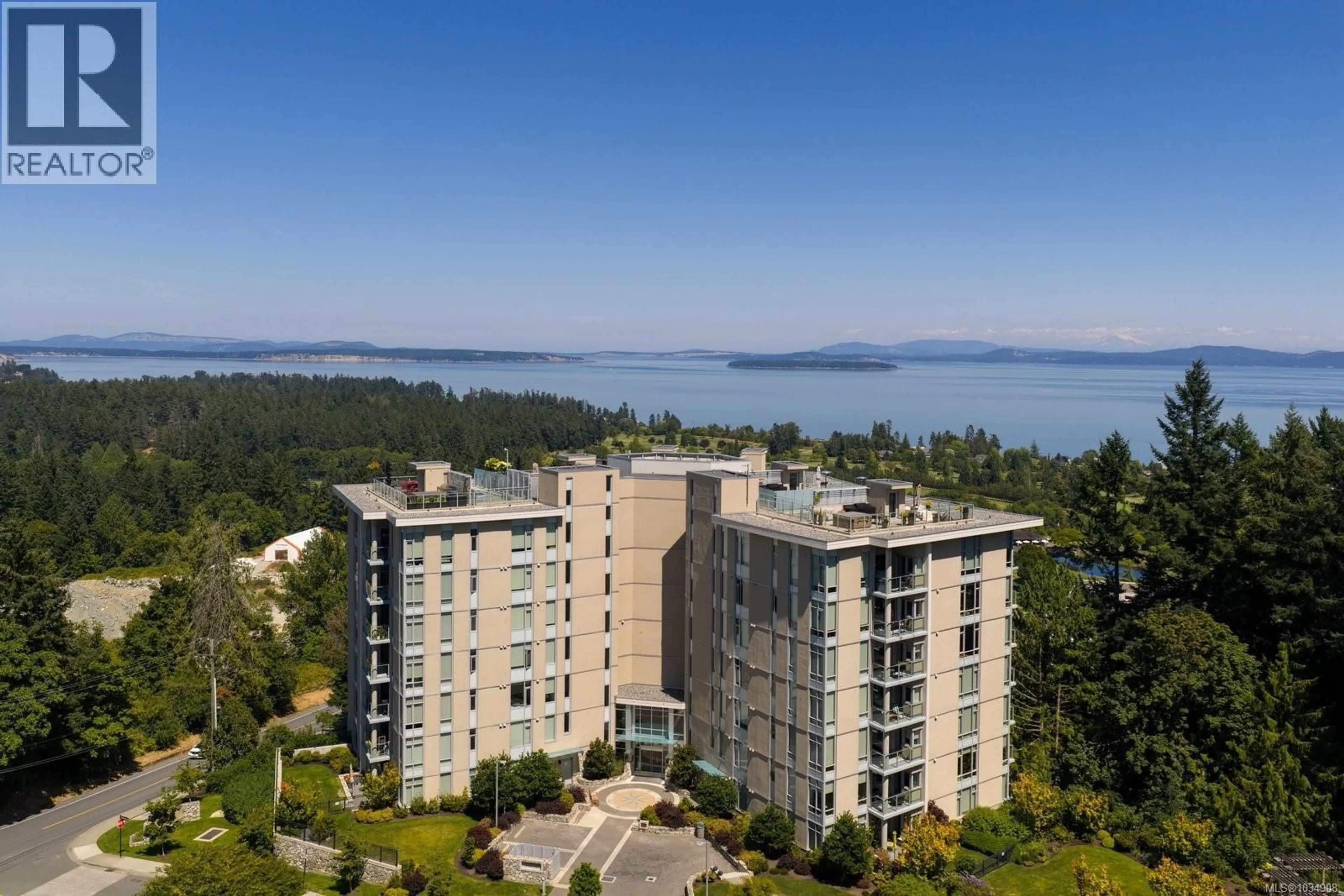 A pic from outside/outdoor area/front of a property/back of a property/a pic from drone, water/lake/river/ocean view for 602 - 5388 HILL RISE TERRACE, Saanich British Columbia V8Y3K3