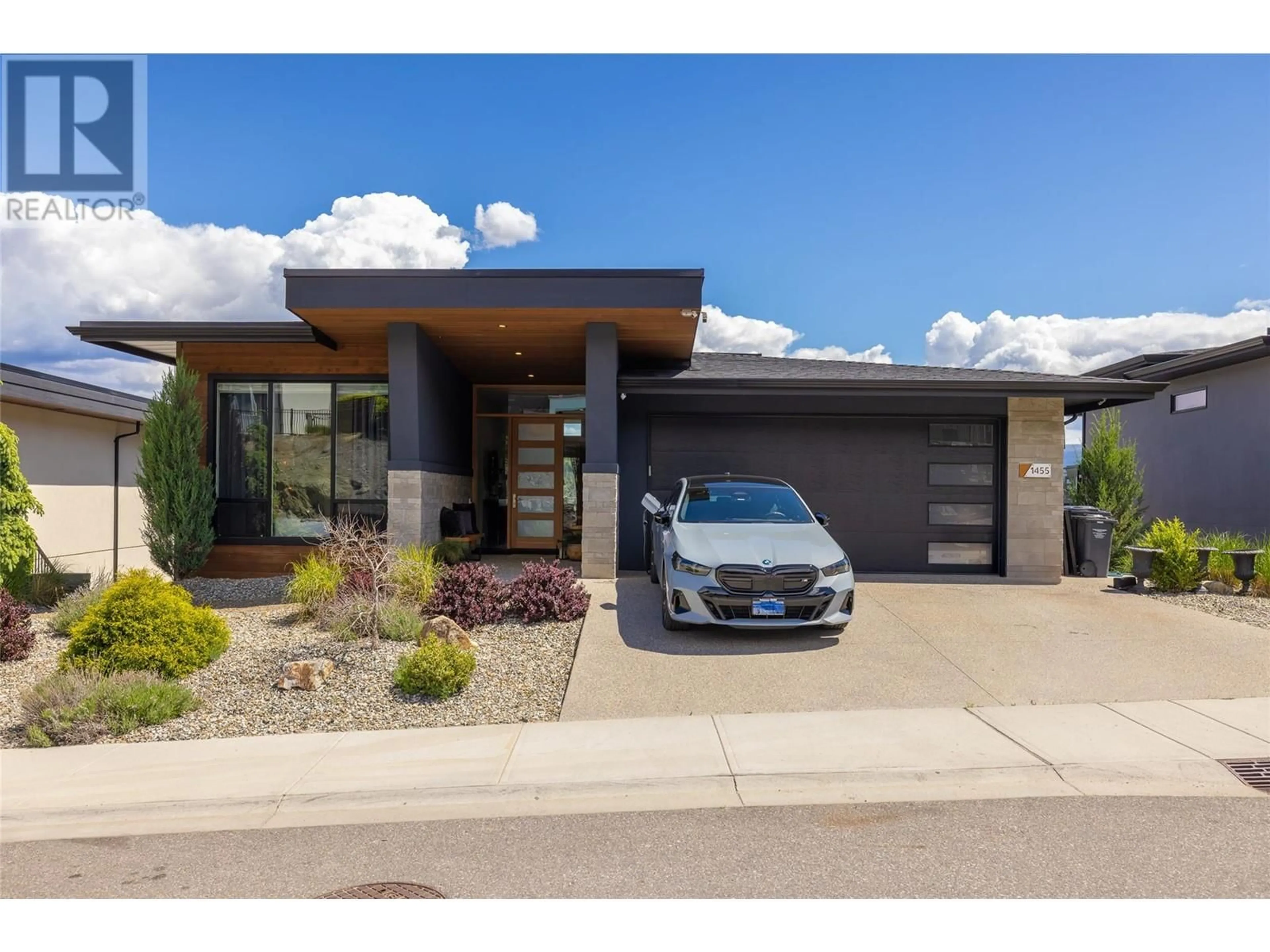 Home with brick exterior material, street for 1455 BENZER COURT, Kelowna British Columbia V1V2Y1