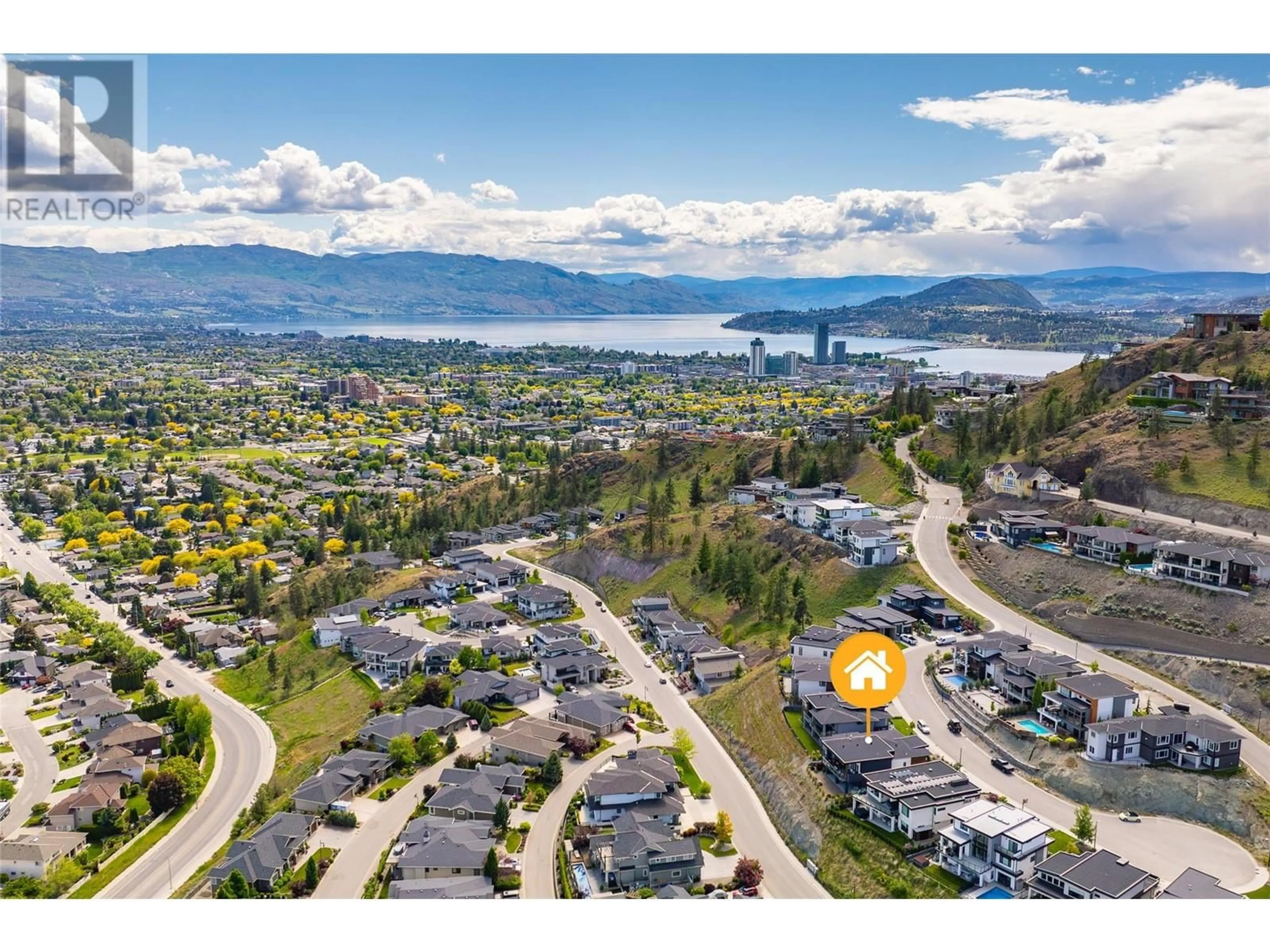 A pic from outside/outdoor area/front of a property/back of a property/a pic from drone, mountain view for 1455 BENZER COURT, Kelowna British Columbia V1V2Y1