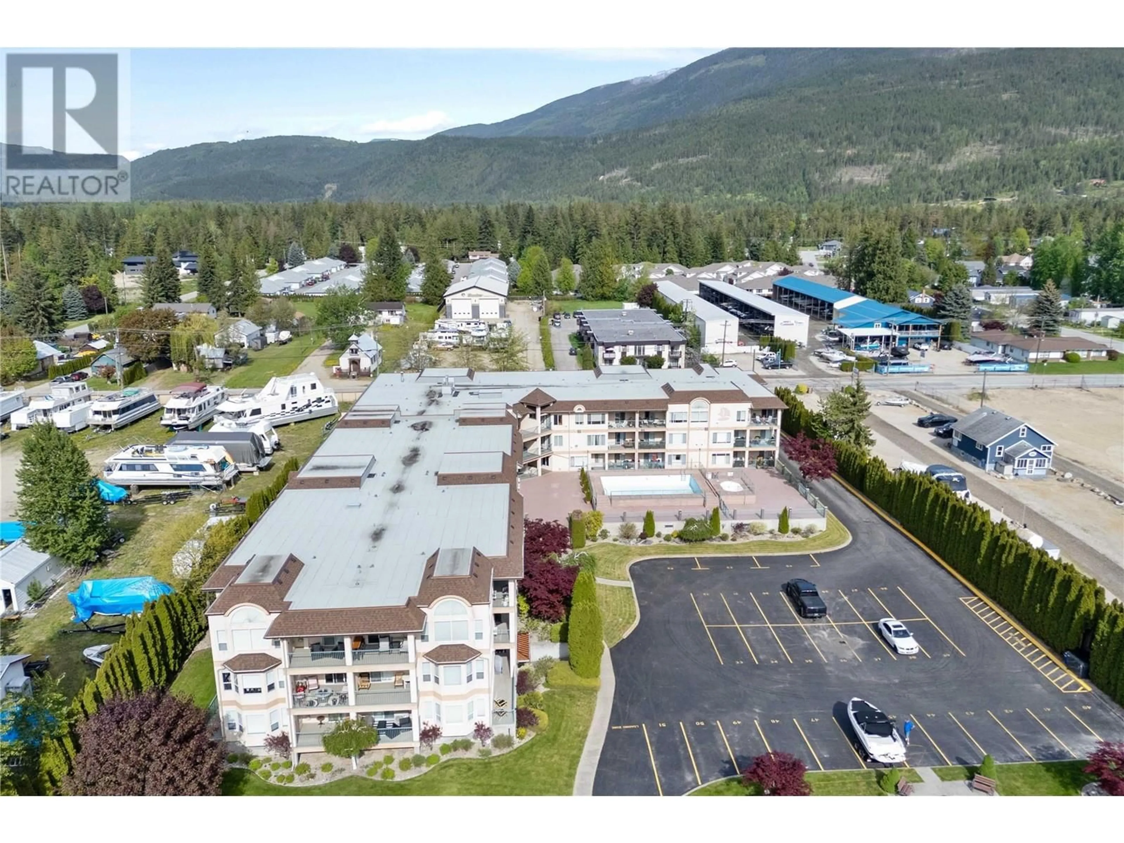 A pic from outside/outdoor area/front of a property/back of a property/a pic from drone, mountain view for 319 - 1002 RIVERSIDE AVENUE, Sicamous British Columbia V0E2V1