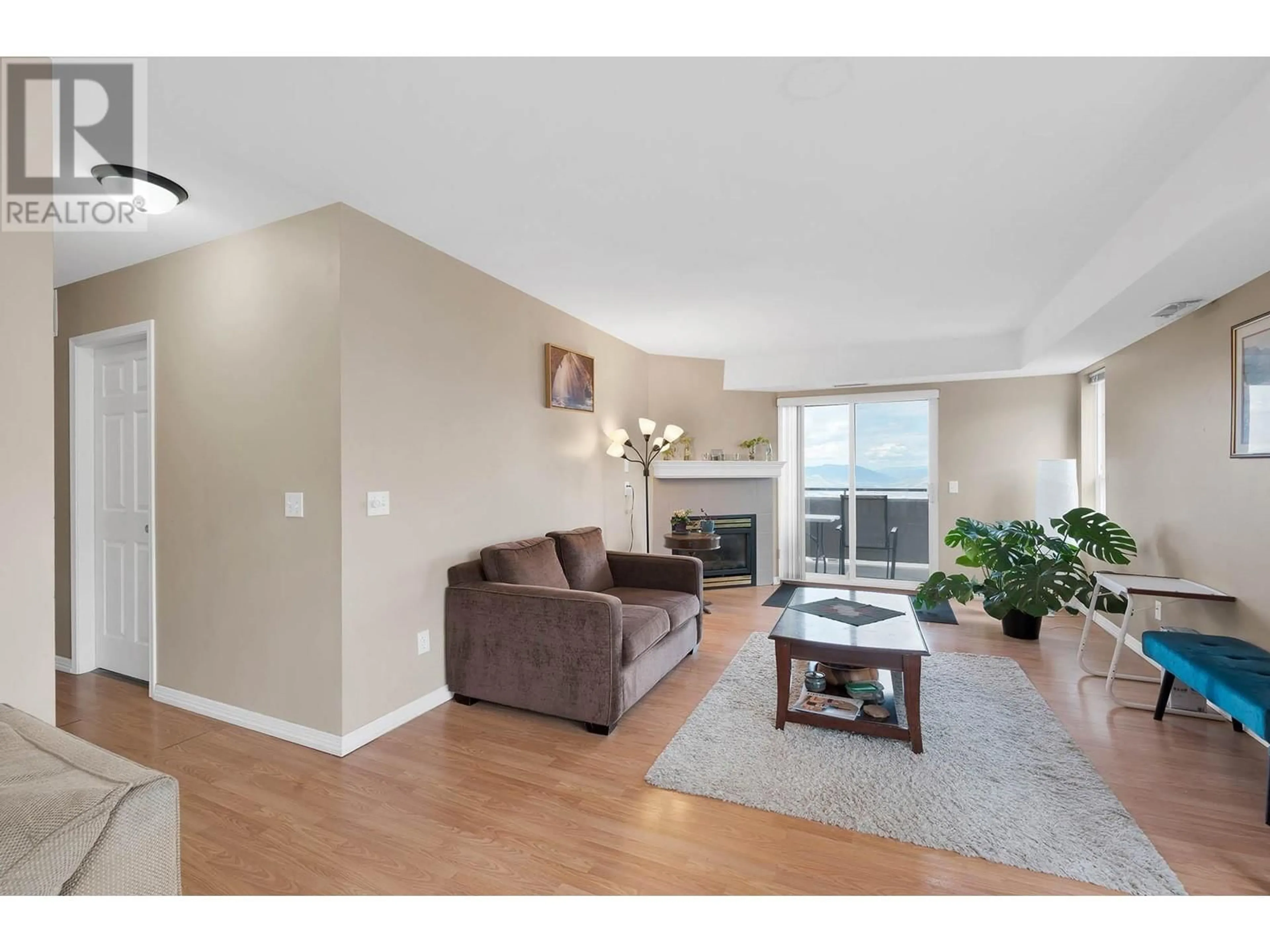 Living room with furniture, wood/laminate floor for 307 - 1185 HUGH ALLAN DRIVE, Kamloops British Columbia V1S1T3