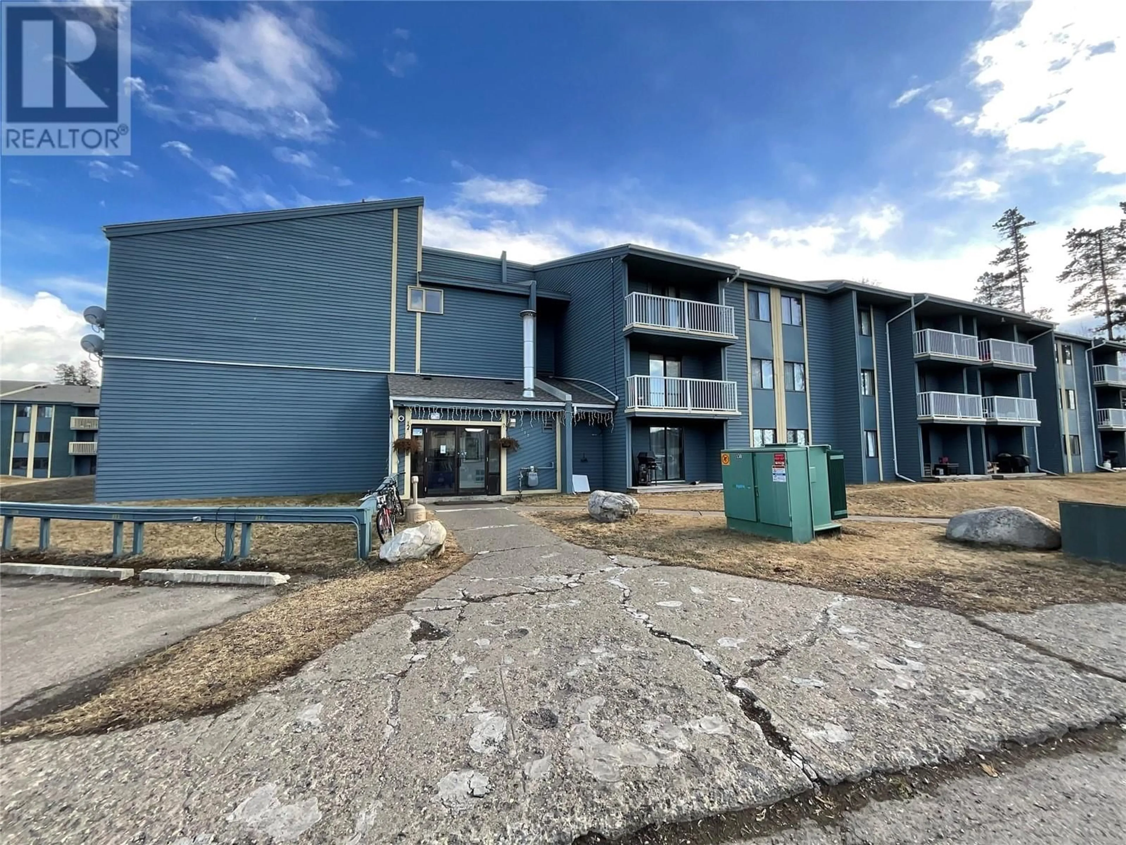 A pic from outside/outdoor area/front of a property/back of a property/a pic from drone, building for 105 - 212 SPIEKER AVENUE, Tumbler Ridge British Columbia V0C2W0