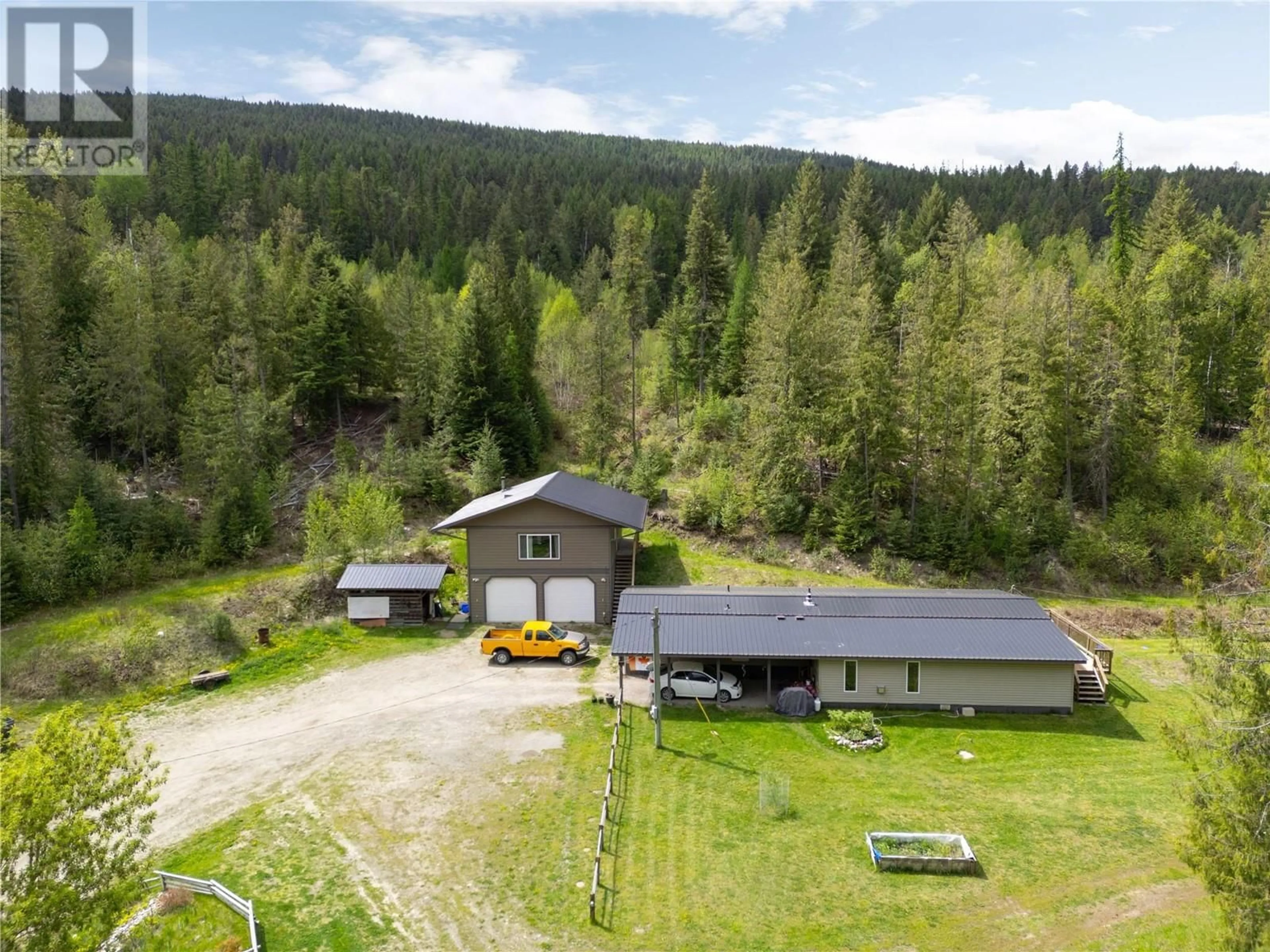 A pic from outside/outdoor area/front of a property/back of a property/a pic from drone, unknown for 68 SPECHT ROAD, Cherryville British Columbia V0E2G3
