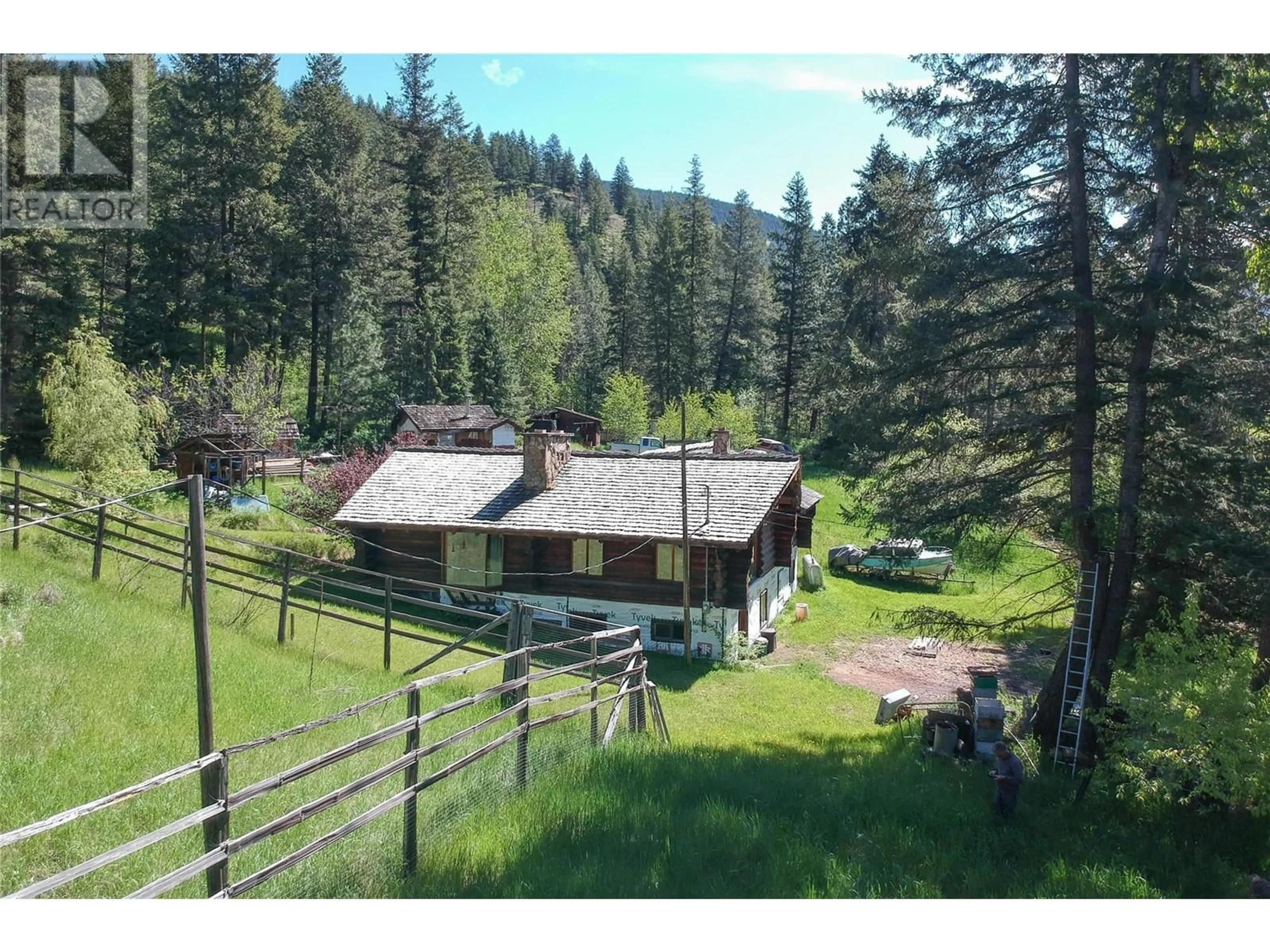 A pic from outside/outdoor area/front of a property/back of a property/a pic from drone, mountain view for 571 CREIGHTON VALLEY ROAD, Lumby British Columbia V0E2G1