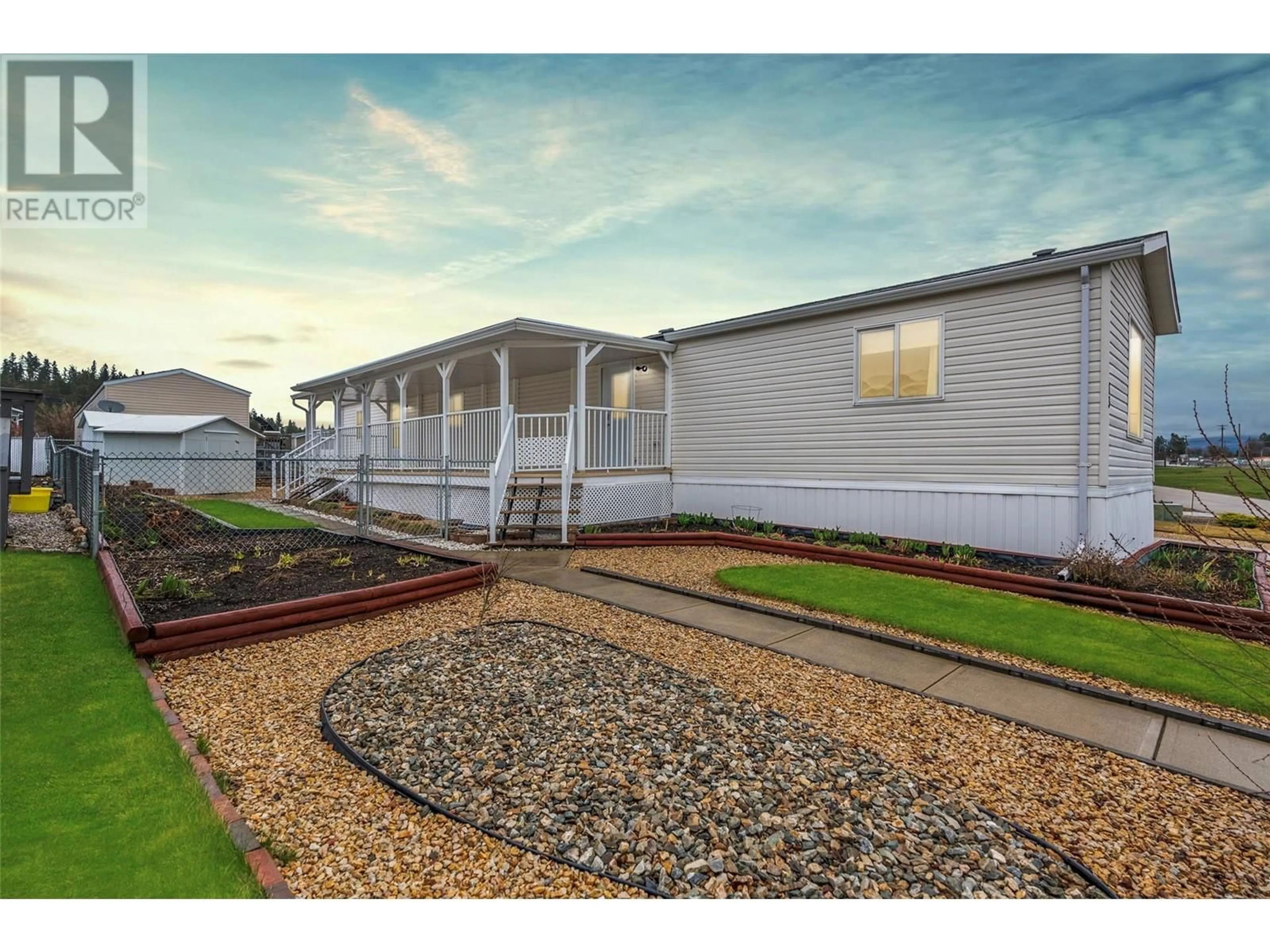 A pic from outside/outdoor area/front of a property/back of a property/a pic from drone, unknown for 13 - 12560 WESTSIDE ROAD, Vernon British Columbia V1H1S9