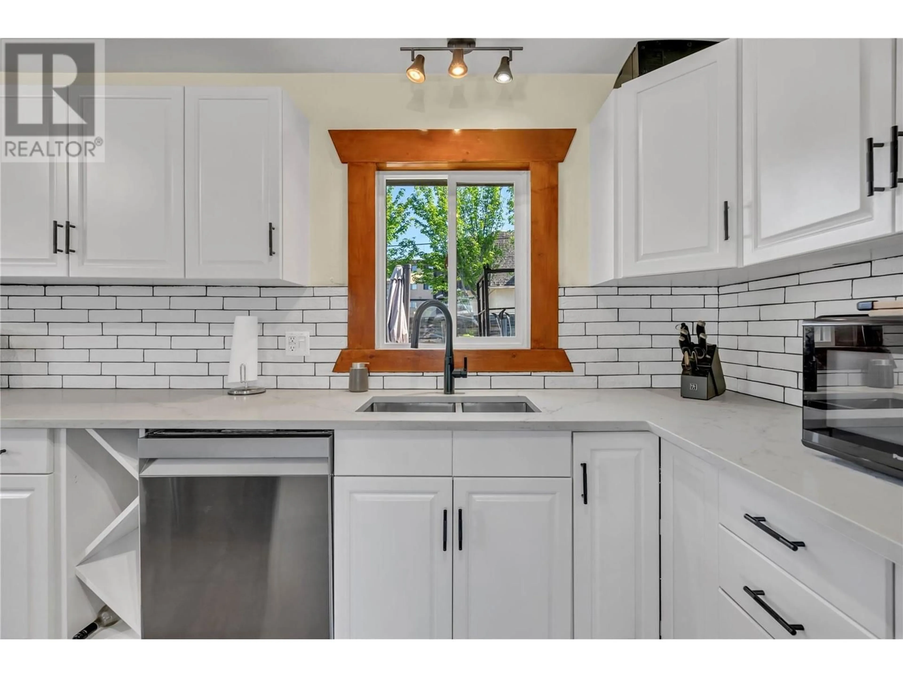 Open concept kitchen, ceramic/tile floor for 53 GRANBY PLACE, Penticton British Columbia V2A2Z3