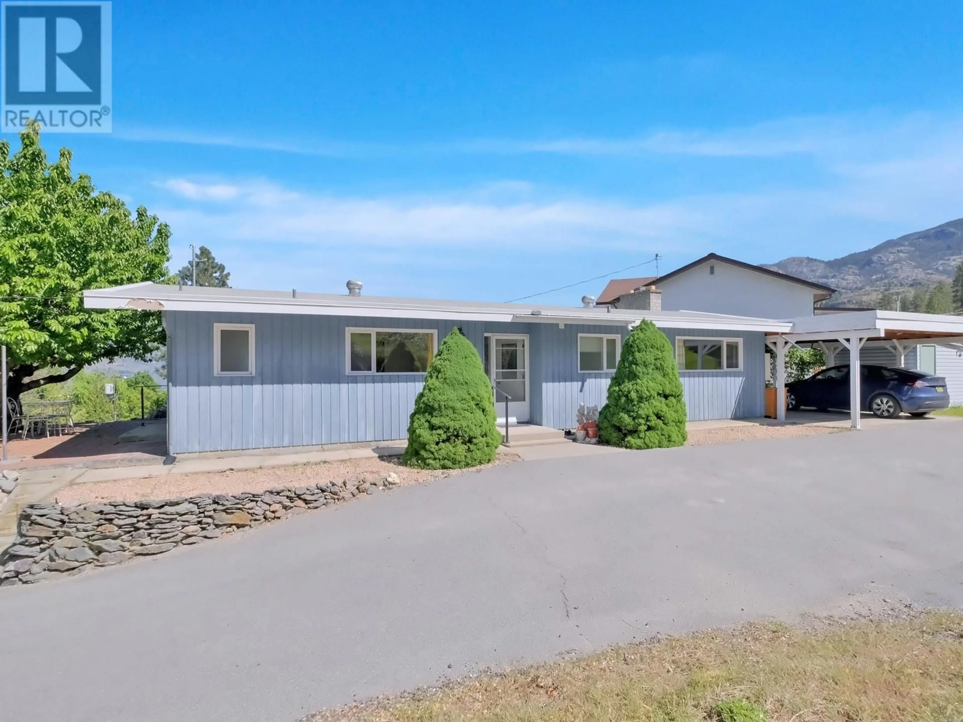 Home with vinyl exterior material, street for 339 DEVON DRIVE, Okanagan Falls British Columbia V0H1R5