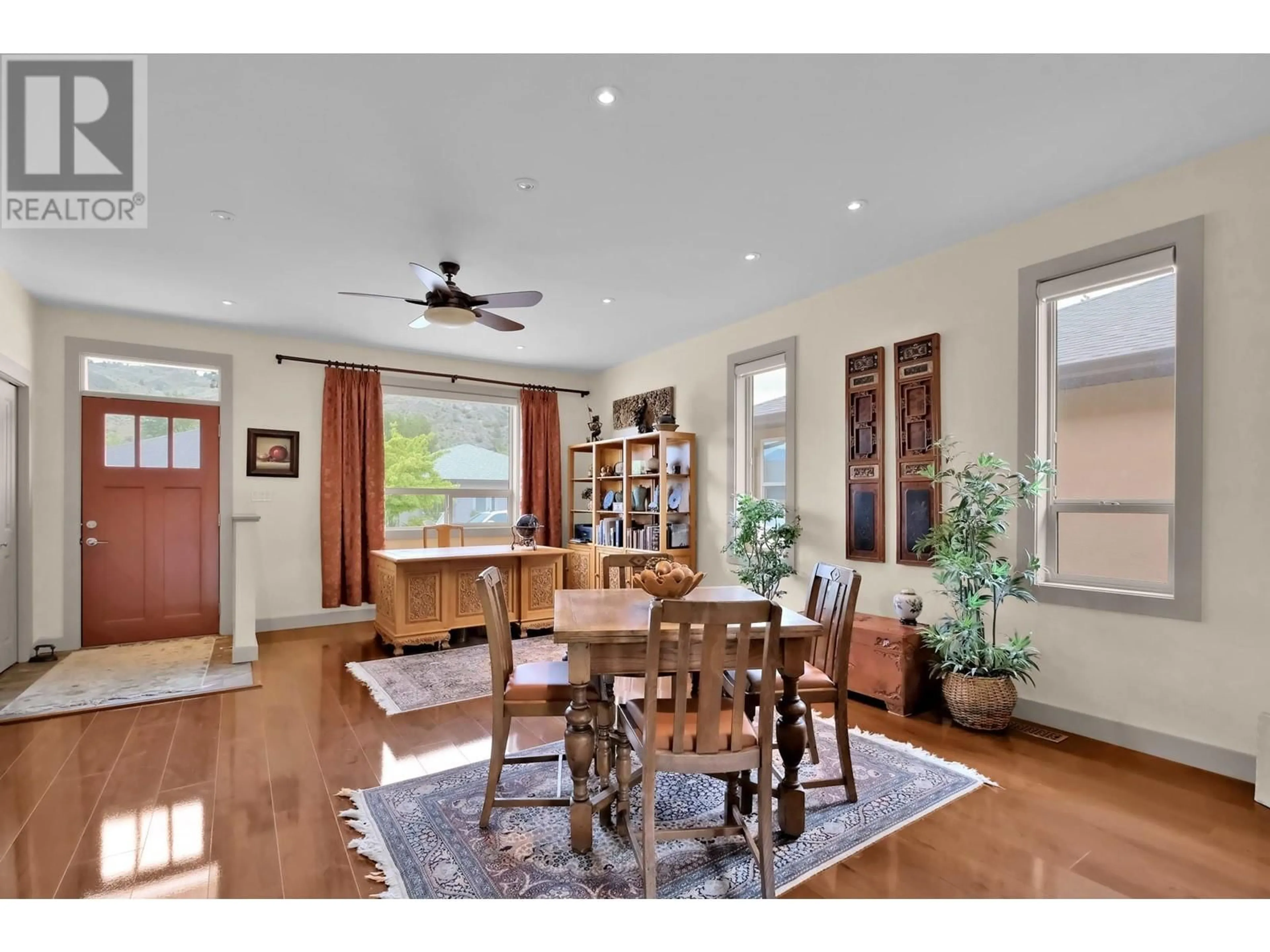 Dining room, wood/laminate floor for 135 WILLOWS PLACE, Oliver British Columbia V0H1T4