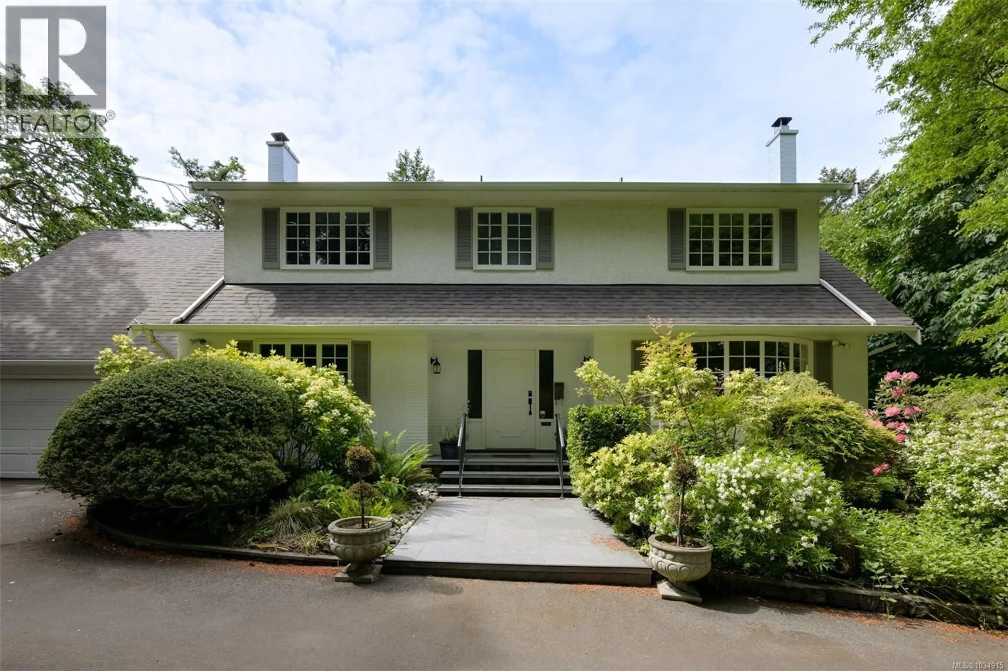 Home with vinyl exterior material, street for 2861 TUDOR AVENUE, Saanich British Columbia V8N1L6