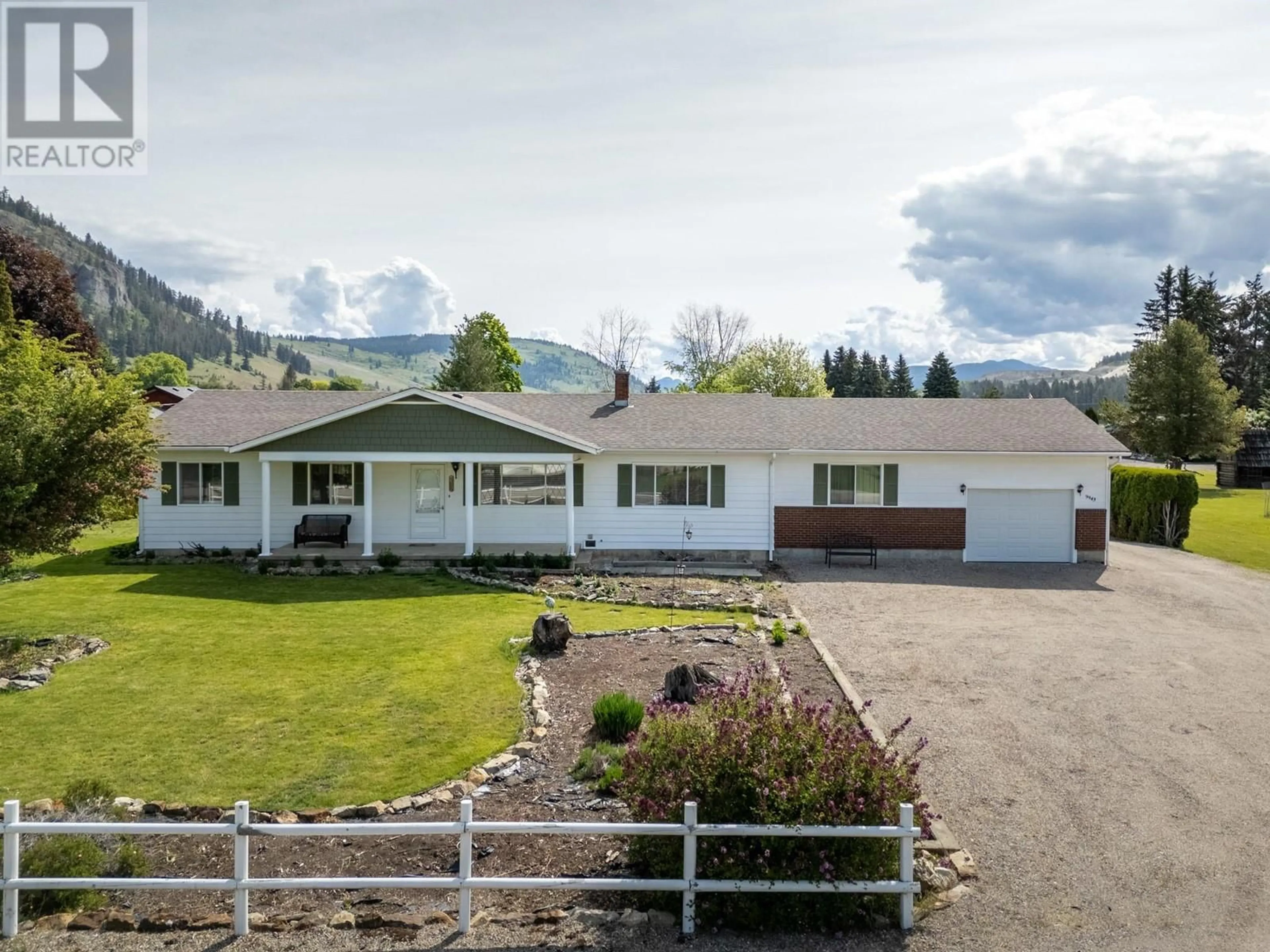 A pic from outside/outdoor area/front of a property/back of a property/a pic from drone, mountain view for 9943 PARK LANE, Coldstream British Columbia V1B3E4