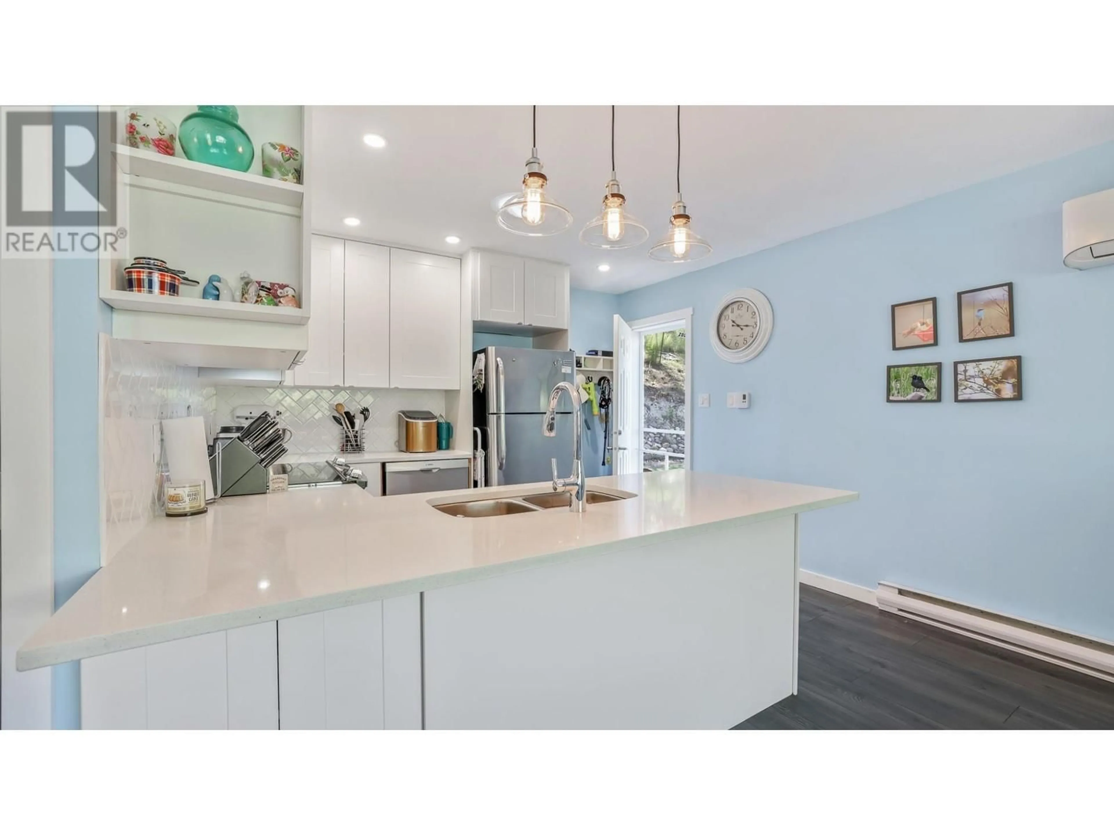 Open concept kitchen, ceramic/tile floor for 8264 HOBBITT FRONTAGE ROAD, Dry Gulch British Columbia V0A1M0