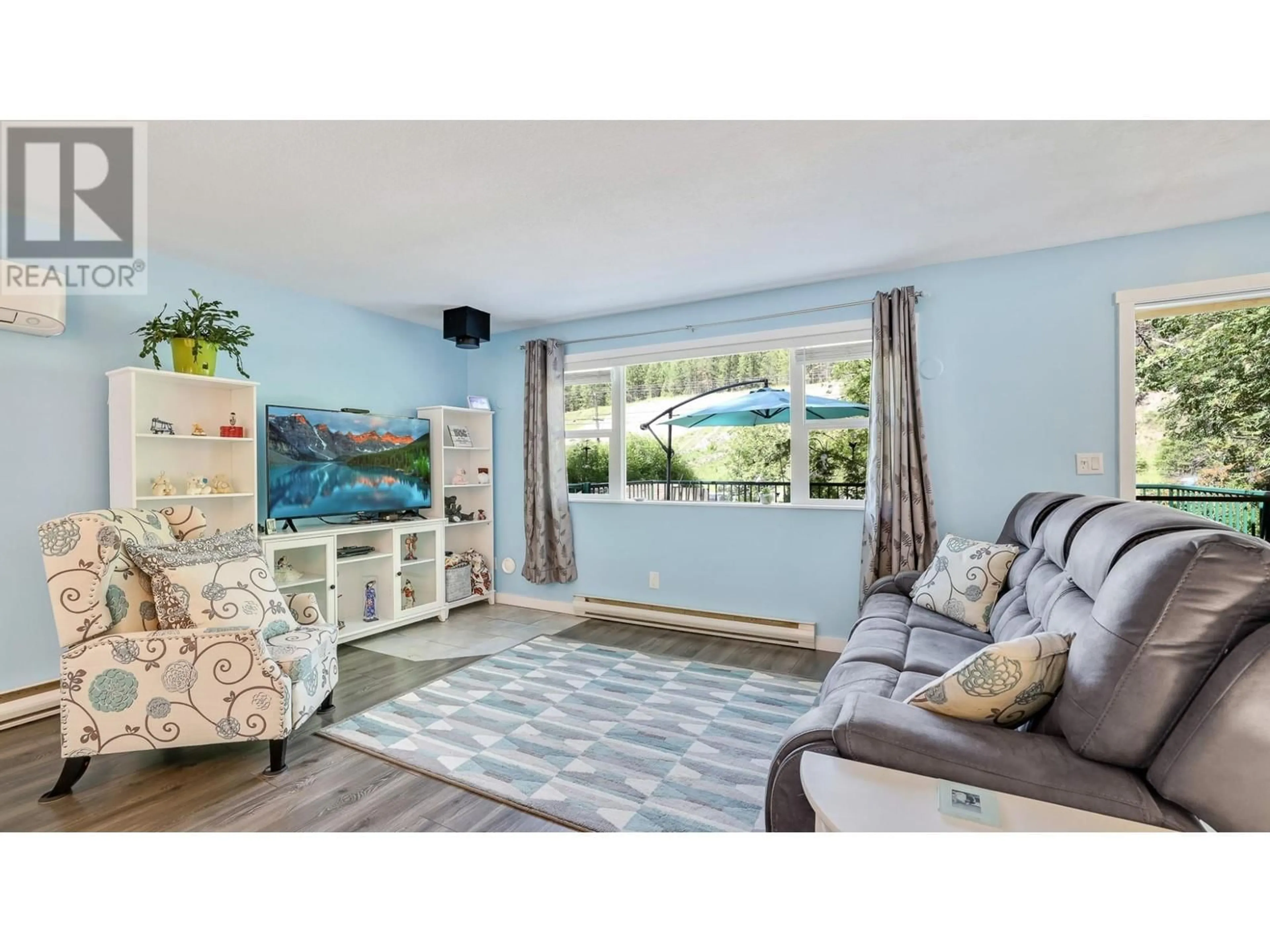 Living room with furniture, unknown for 8264 HOBBITT FRONTAGE ROAD, Dry Gulch British Columbia V0A1M0