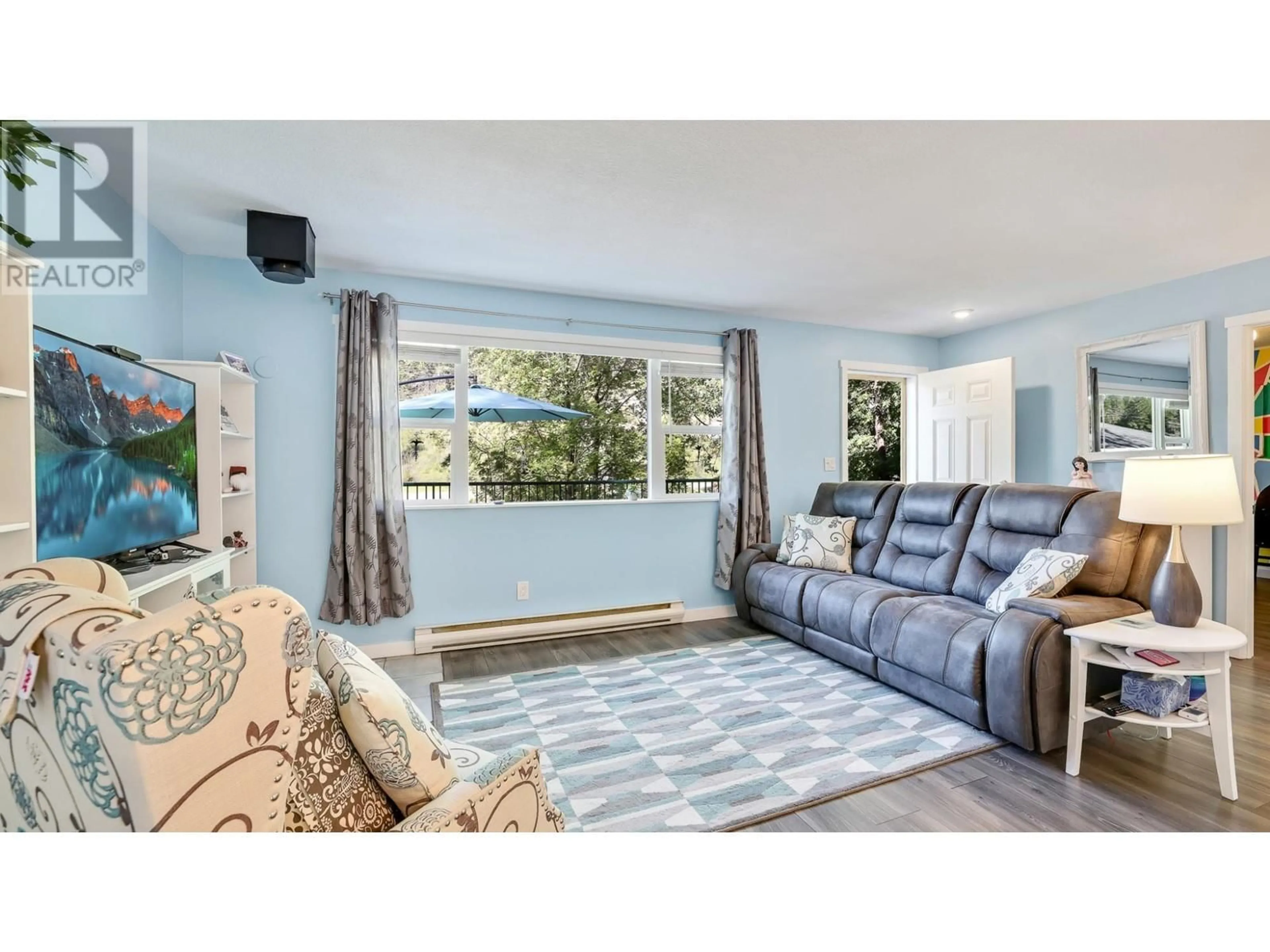 Living room with furniture, unknown for 8264 HOBBITT FRONTAGE ROAD, Dry Gulch British Columbia V0A1M0