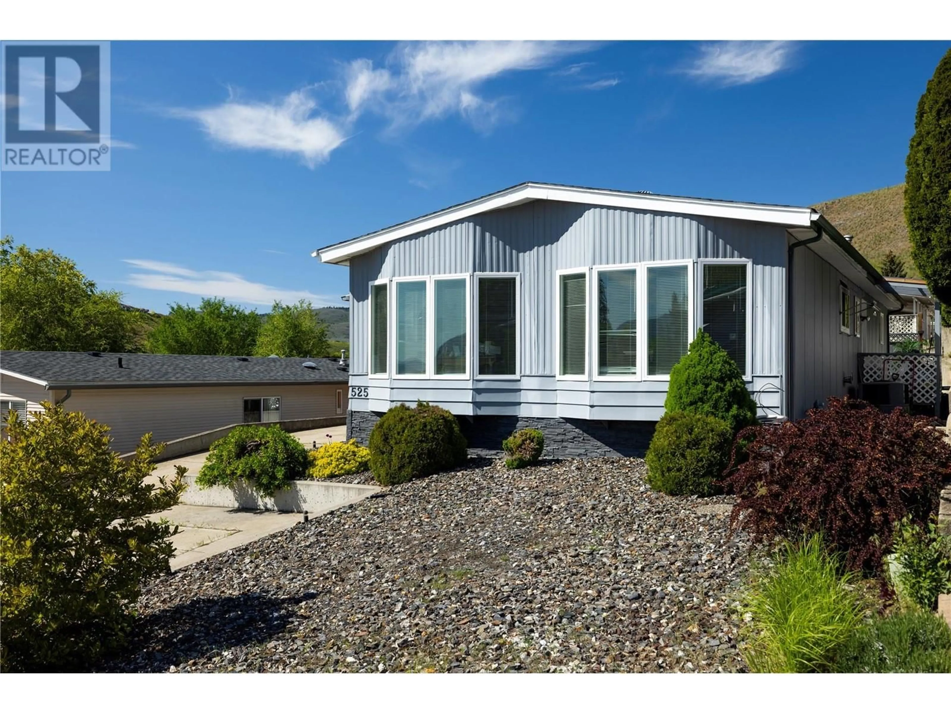 Home with vinyl exterior material, street for 525 GUILDFORD COURT, Coldstream British Columbia V1B2E3