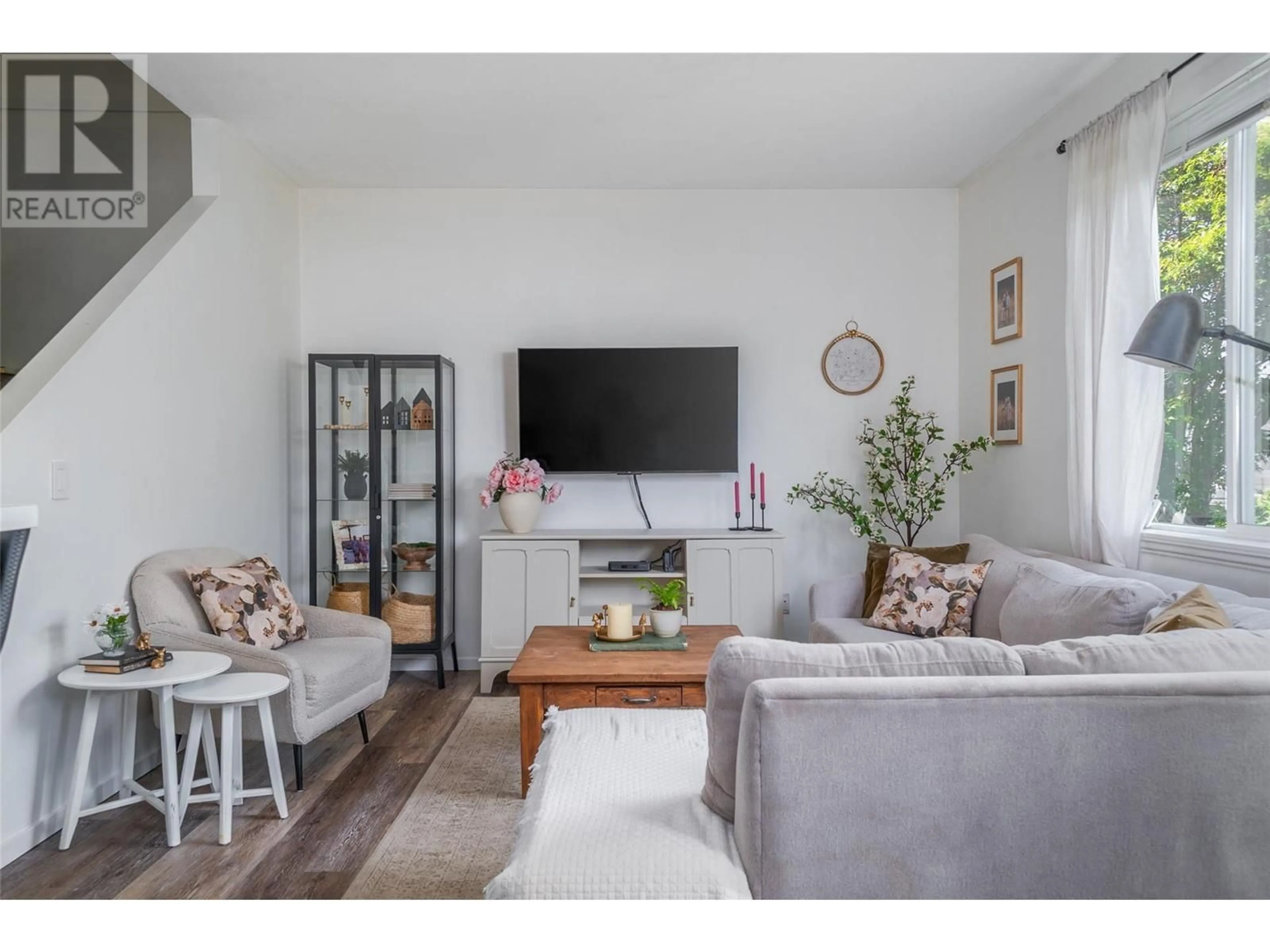 Living room with furniture, unknown for 102 - 1420 TERAI ROAD, Kelowna British Columbia V1X7H3