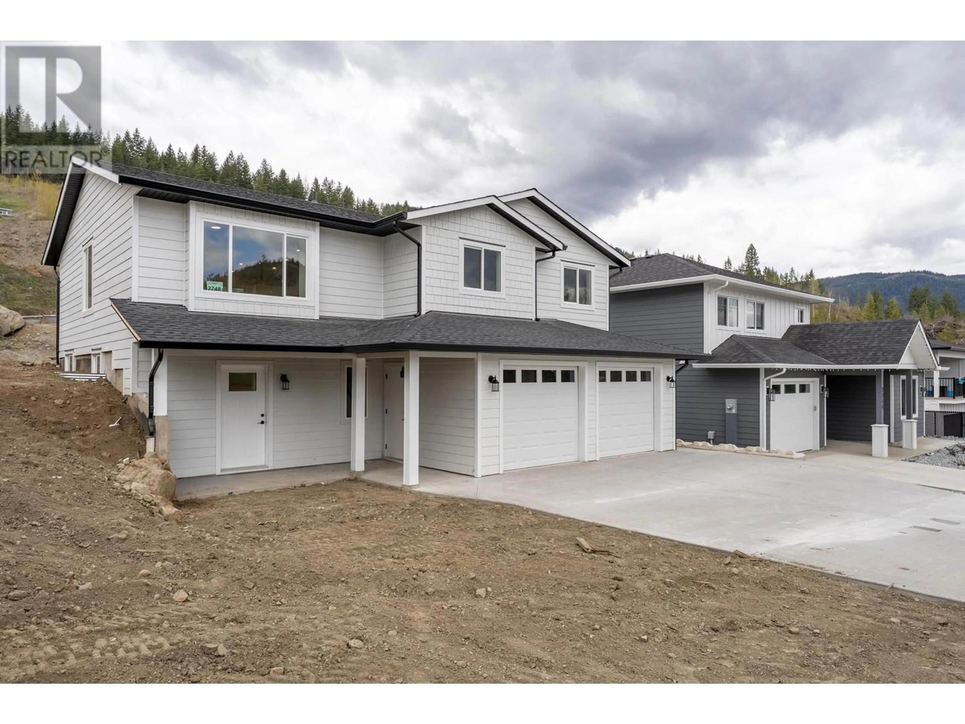 Home with vinyl exterior material, street for 2748 CEDAR RIDGE STREET, Lumby British Columbia V0E2G0