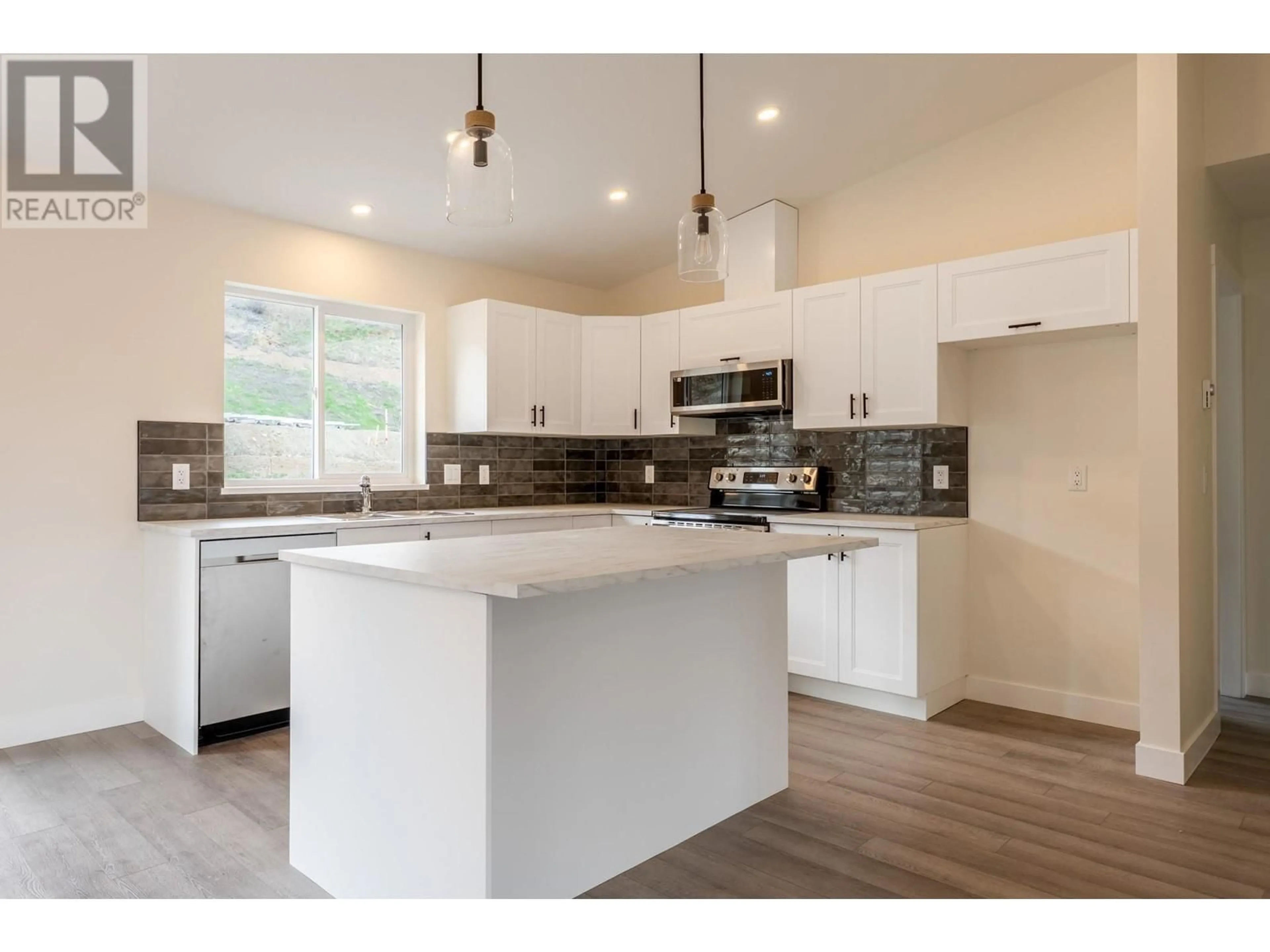 Open concept kitchen, unknown for 2748 CEDAR RIDGE STREET, Lumby British Columbia V0E2G0