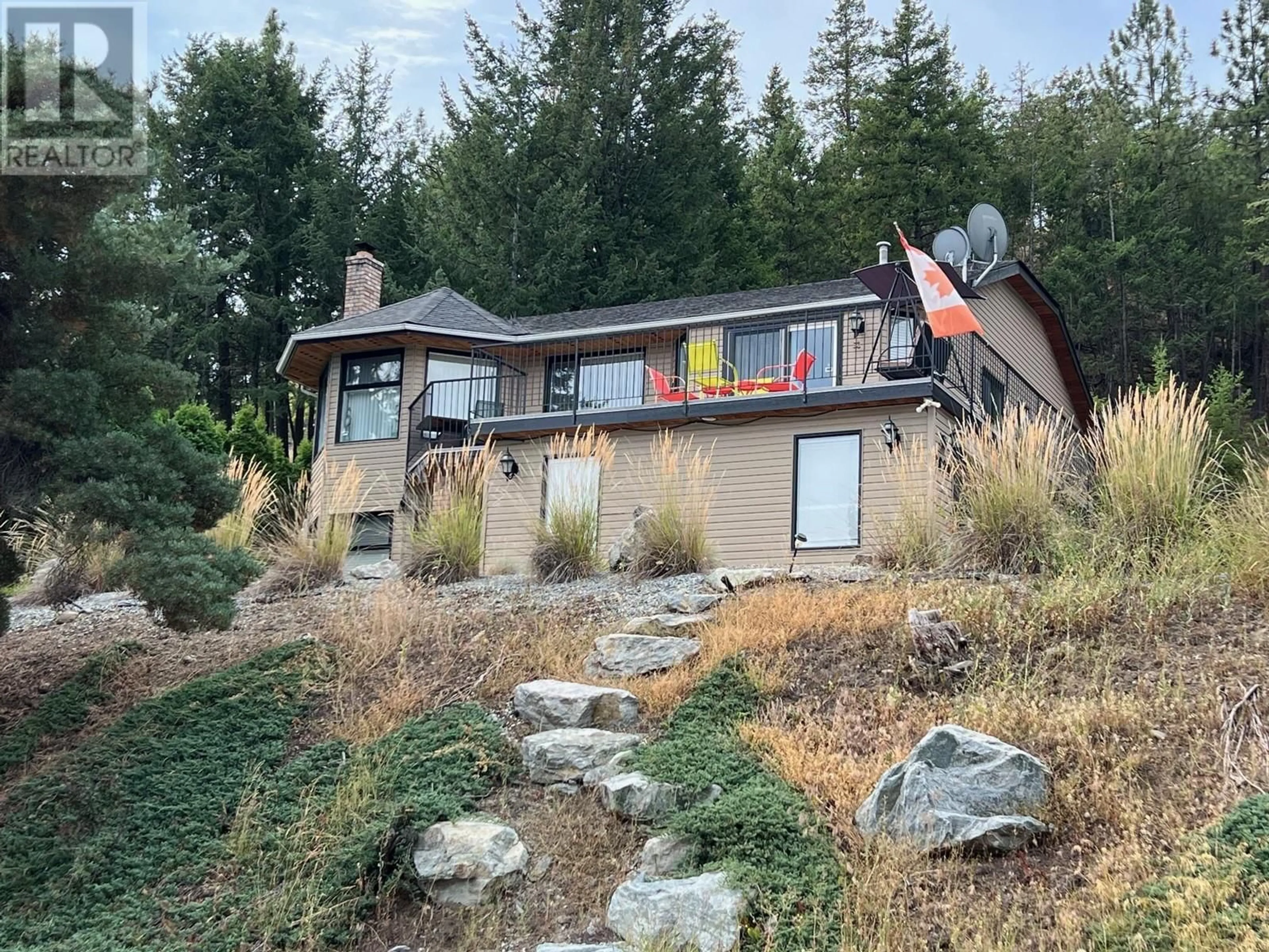 A pic from outside/outdoor area/front of a property/back of a property/a pic from drone, water/lake/river/ocean view for 1820 OLYMPUS WAY, West Kelowna British Columbia V1Z3J1
