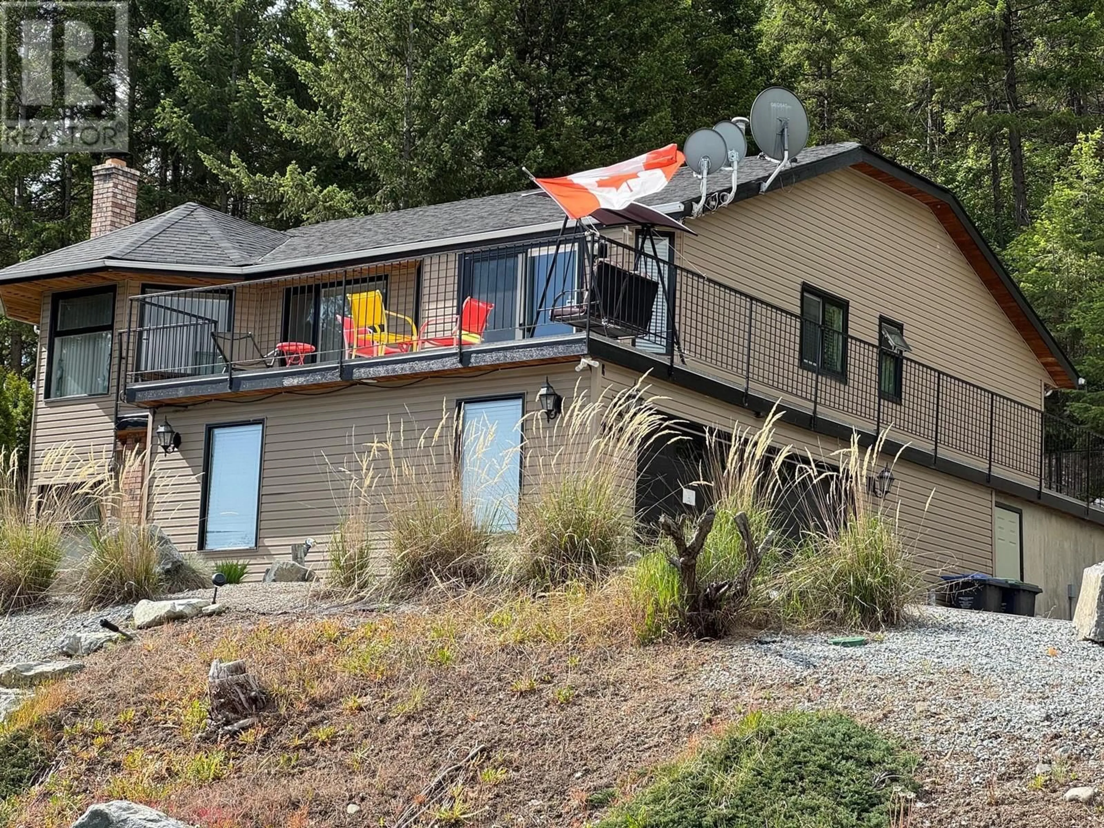 Home with vinyl exterior material, mountain view for 1820 OLYMPUS WAY, West Kelowna British Columbia V1Z3J1