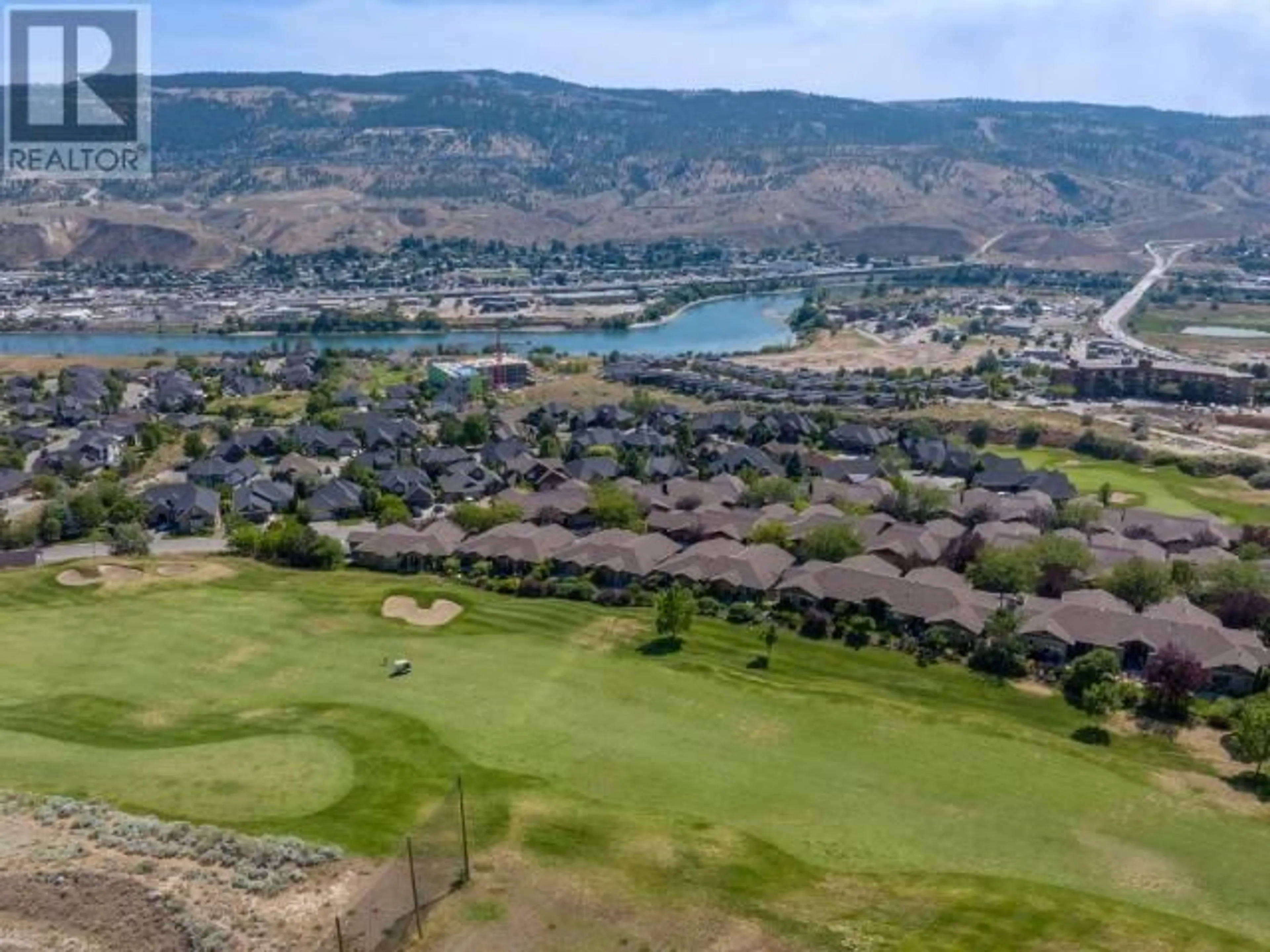 A pic from outside/outdoor area/front of a property/back of a property/a pic from drone, water/lake/river/ocean view for 1548 GOLF RIDGE DRIVE, Kamloops British Columbia V2H0A5