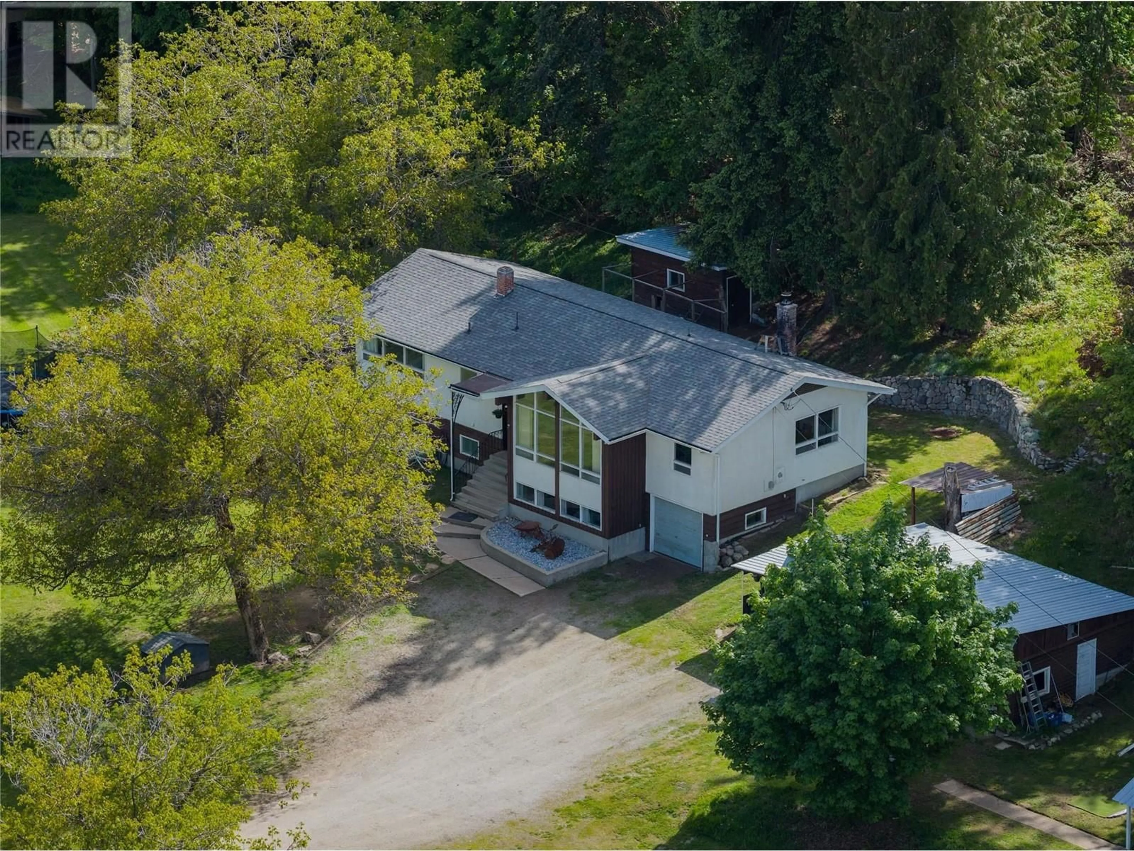 A pic from outside/outdoor area/front of a property/back of a property/a pic from drone, street for 1 MASON ROAD, Castlegar British Columbia V1N3Z1