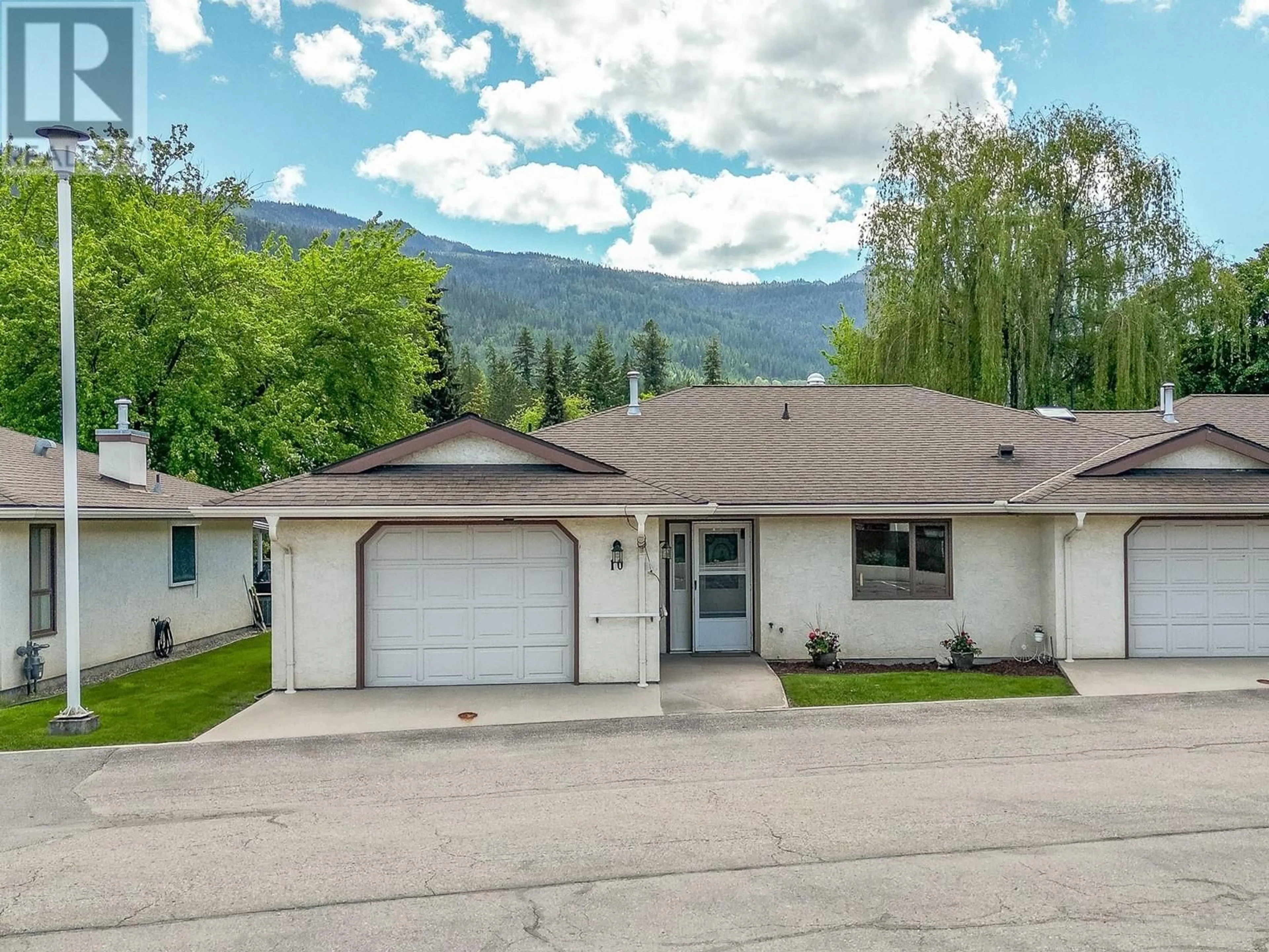 A pic from outside/outdoor area/front of a property/back of a property/a pic from drone, mountain view for 10 - 151 8 AVENUE SOUTHWEST, Salmon Arm British Columbia V1E1B9