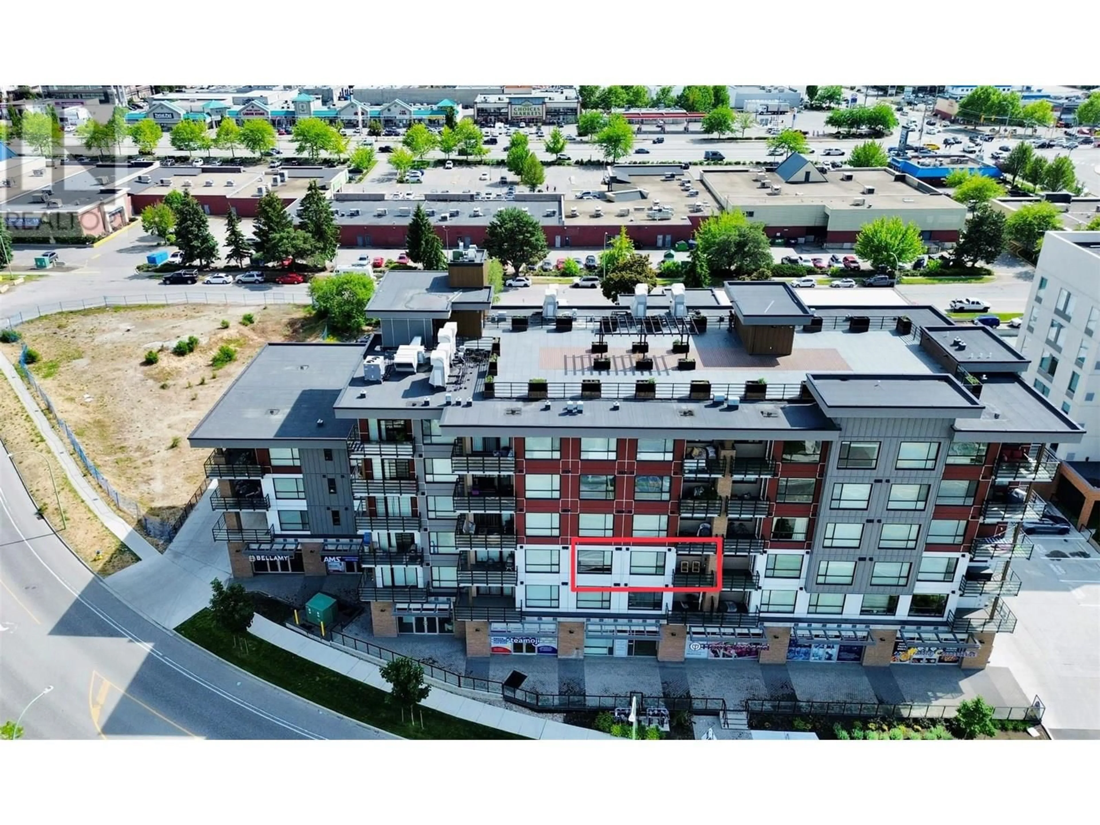 A pic from outside/outdoor area/front of a property/back of a property/a pic from drone, unknown for 305 - 1925 ENTERPRISE WAY, Kelowna British Columbia V1Y9S9