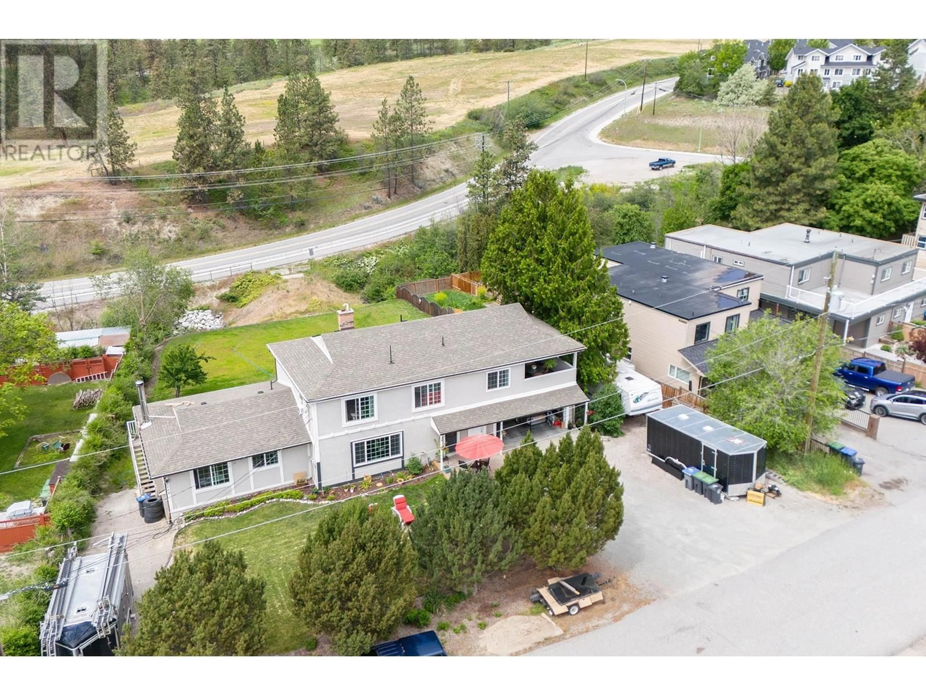 A pic from outside/outdoor area/front of a property/back of a property/a pic from drone, mountain view for 3766 WETTON ROAD, West Kelowna British Columbia V4T2C1