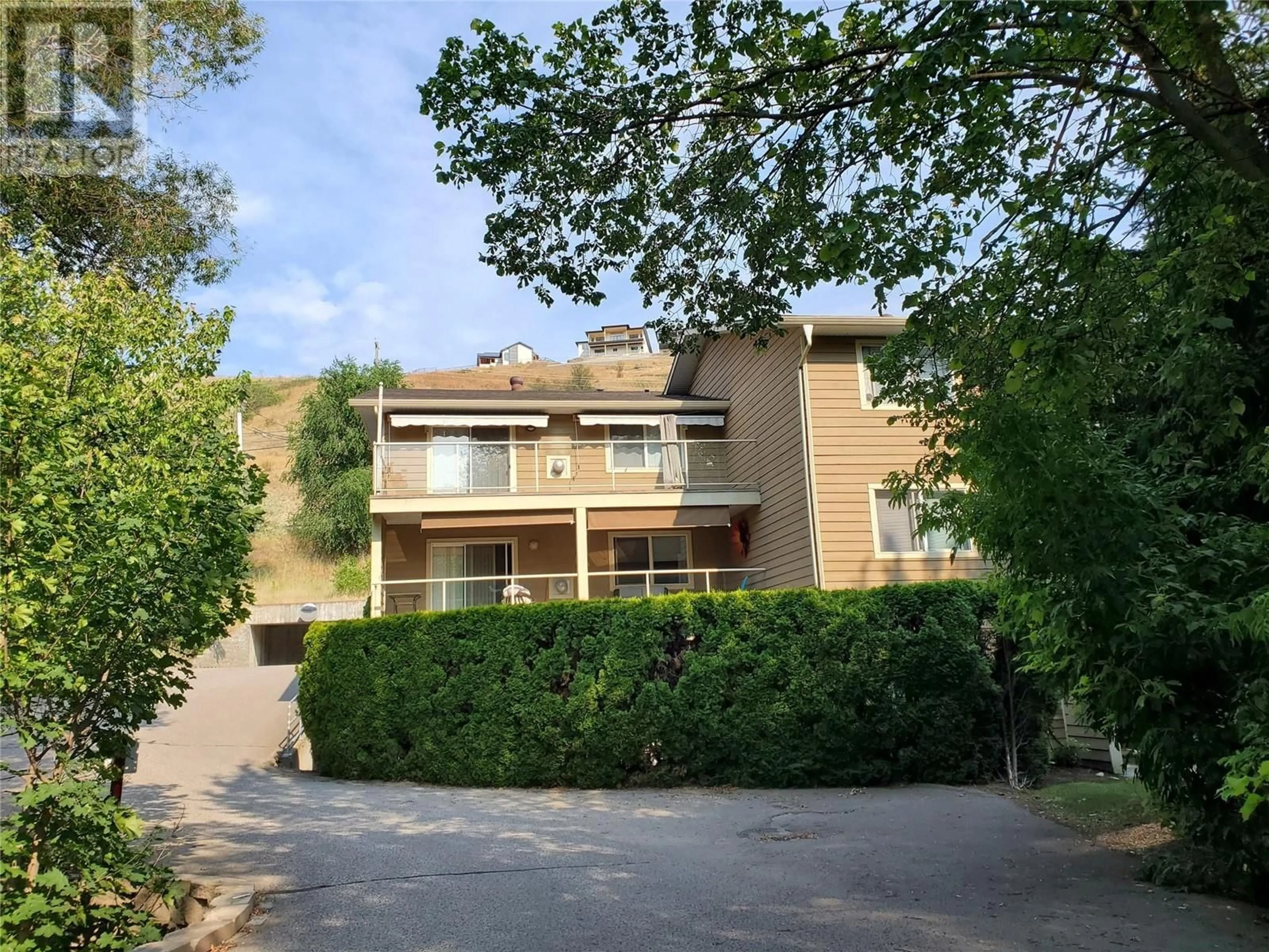 A pic from outside/outdoor area/front of a property/back of a property/a pic from drone, street for 309 - 307 BROWNE ROAD, Vernon British Columbia V1T7M2