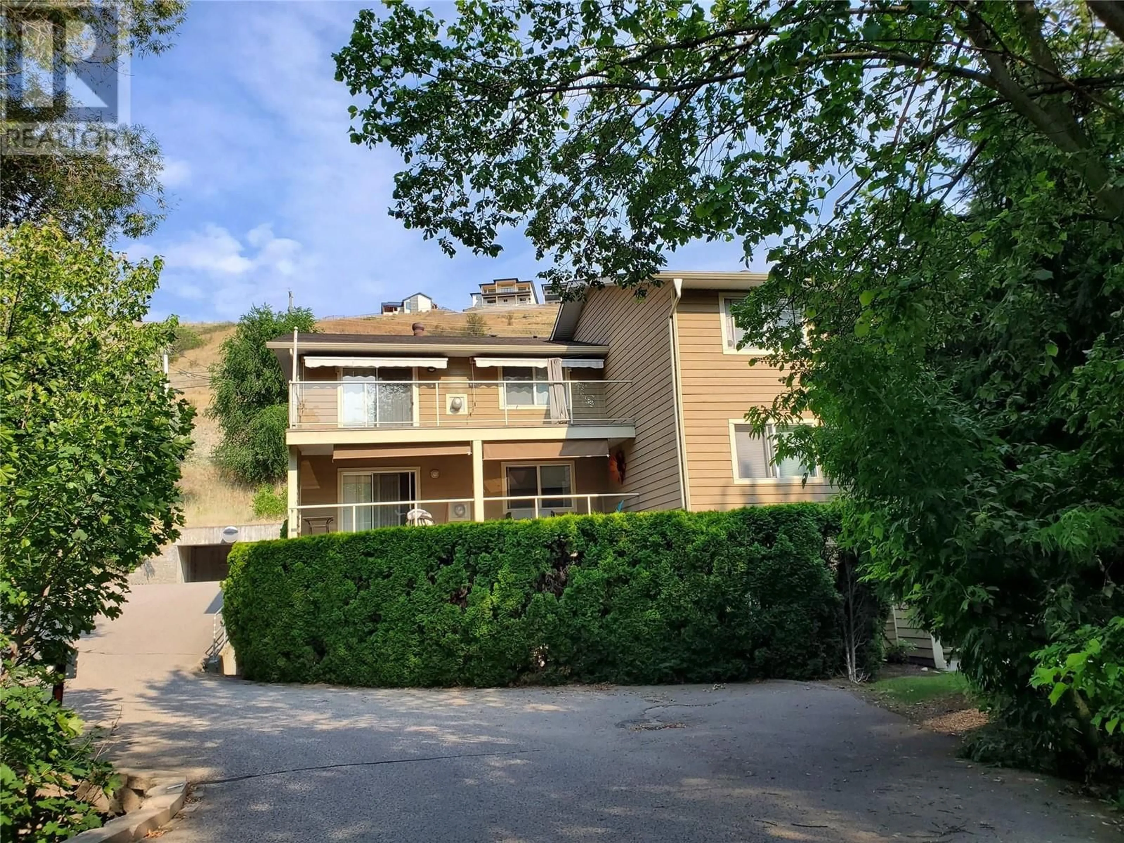A pic from outside/outdoor area/front of a property/back of a property/a pic from drone, street for 309 - 307 BROWNE ROAD, Vernon British Columbia V1T7M2