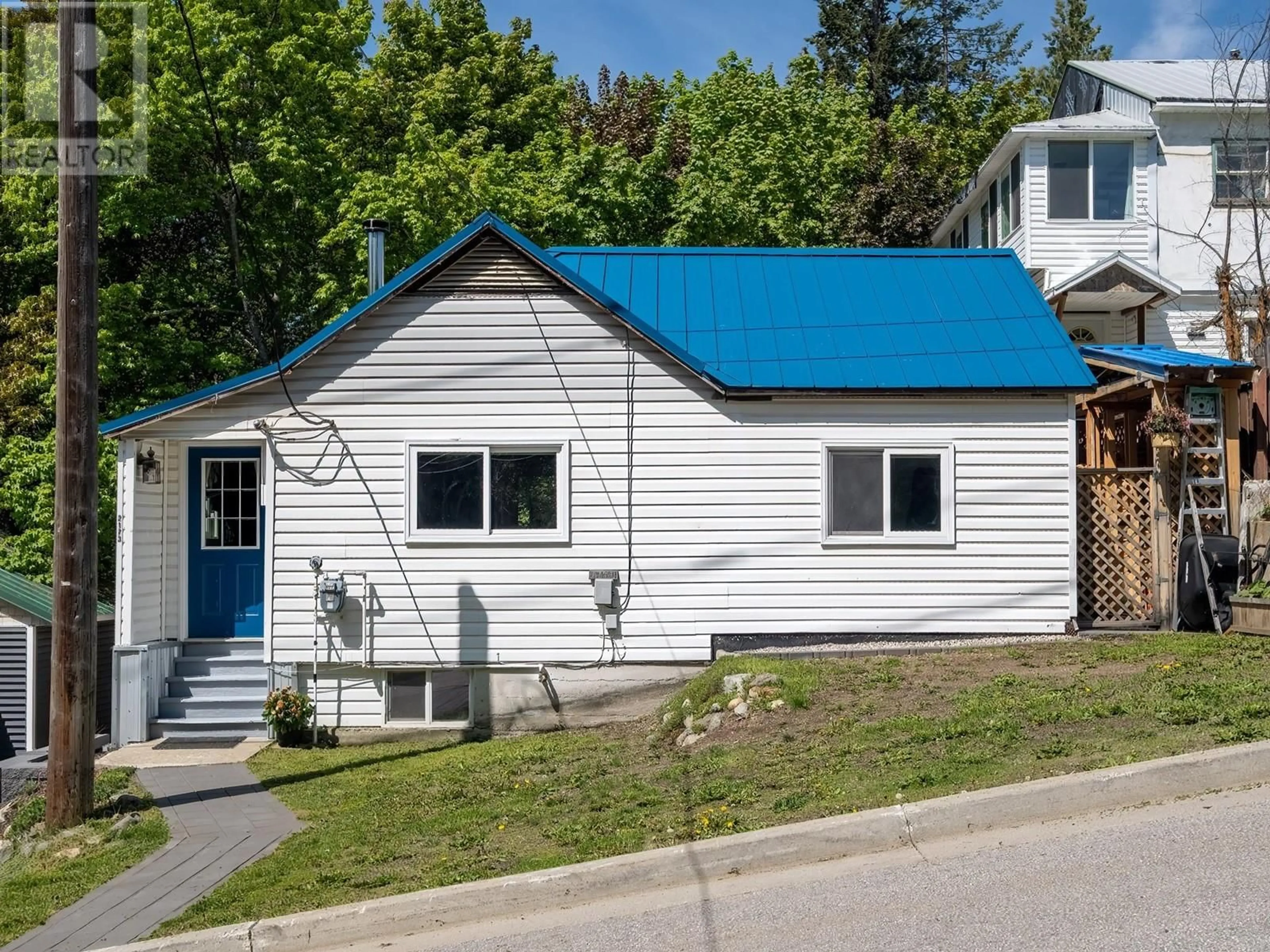 Home with vinyl exterior material, street for 2173 SPOKANE STREET, Rossland British Columbia V0G1Y0