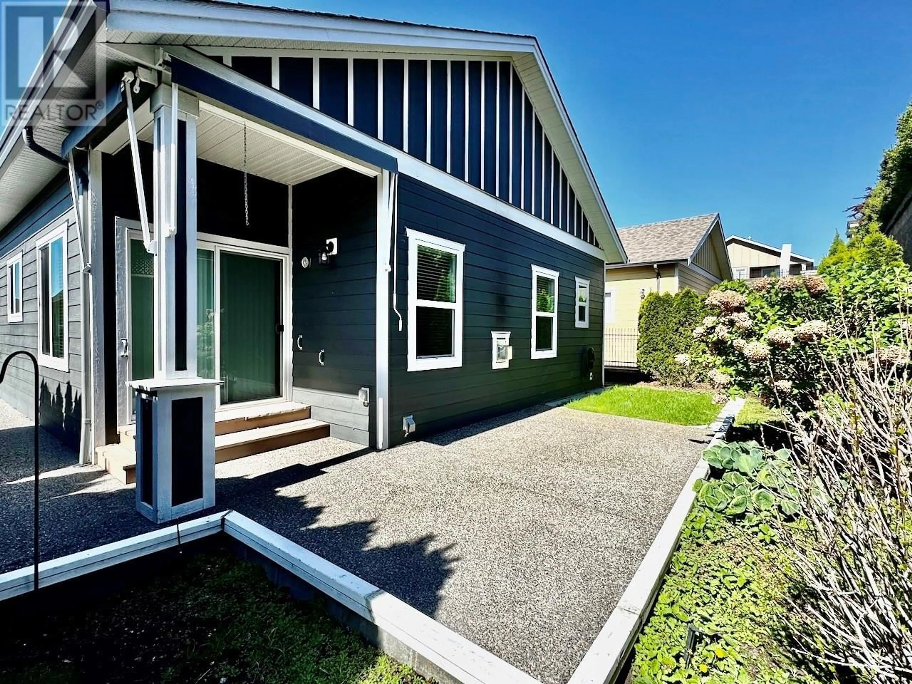 Home with vinyl exterior material, street for 2097 ACORN CRESCENT, West Kelowna British Columbia V4T3A5