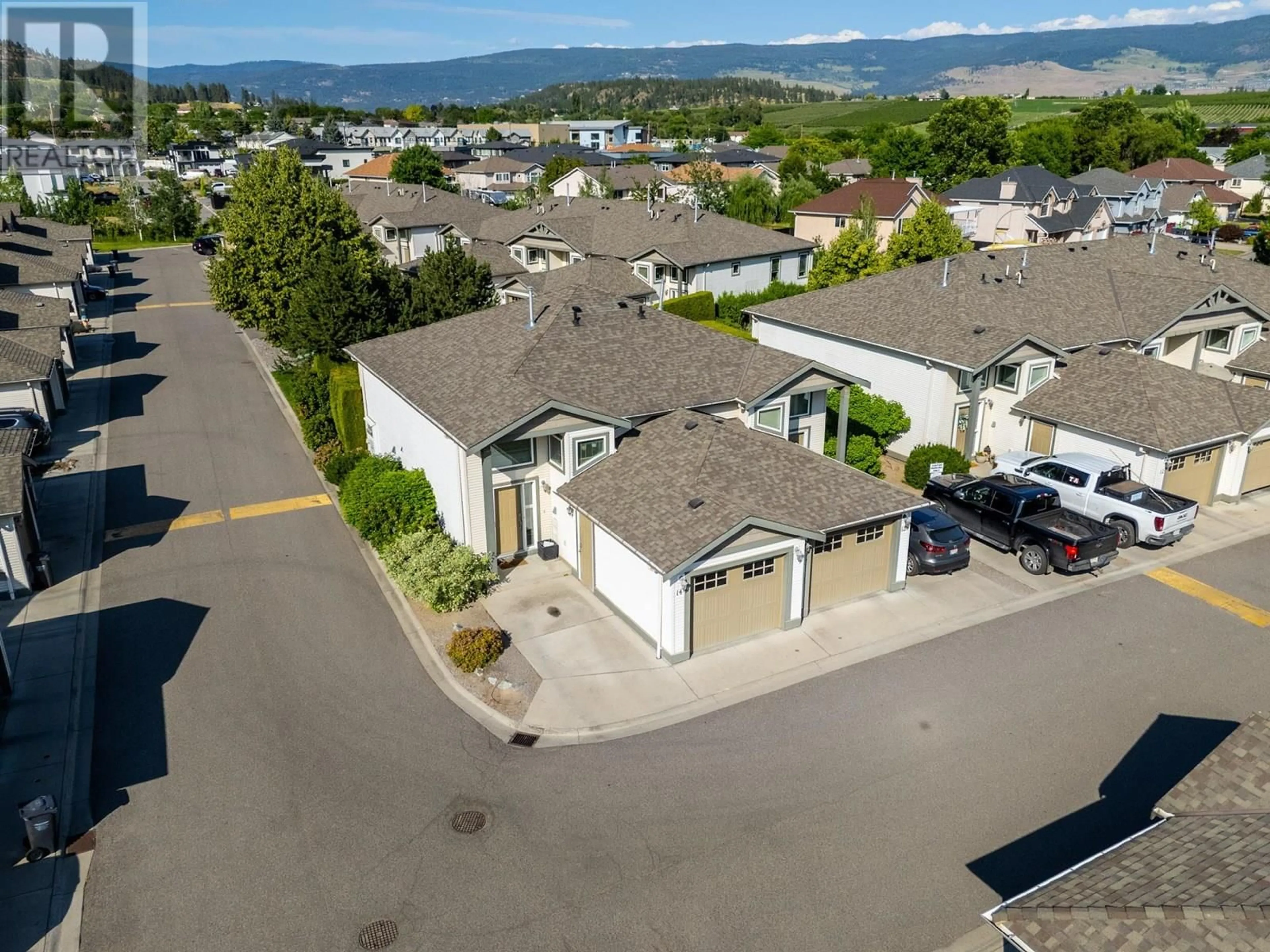 A pic from outside/outdoor area/front of a property/back of a property/a pic from drone, mountain view for 14 - 225 GLEN PARK DRIVE, Kelowna British Columbia V1V2X5