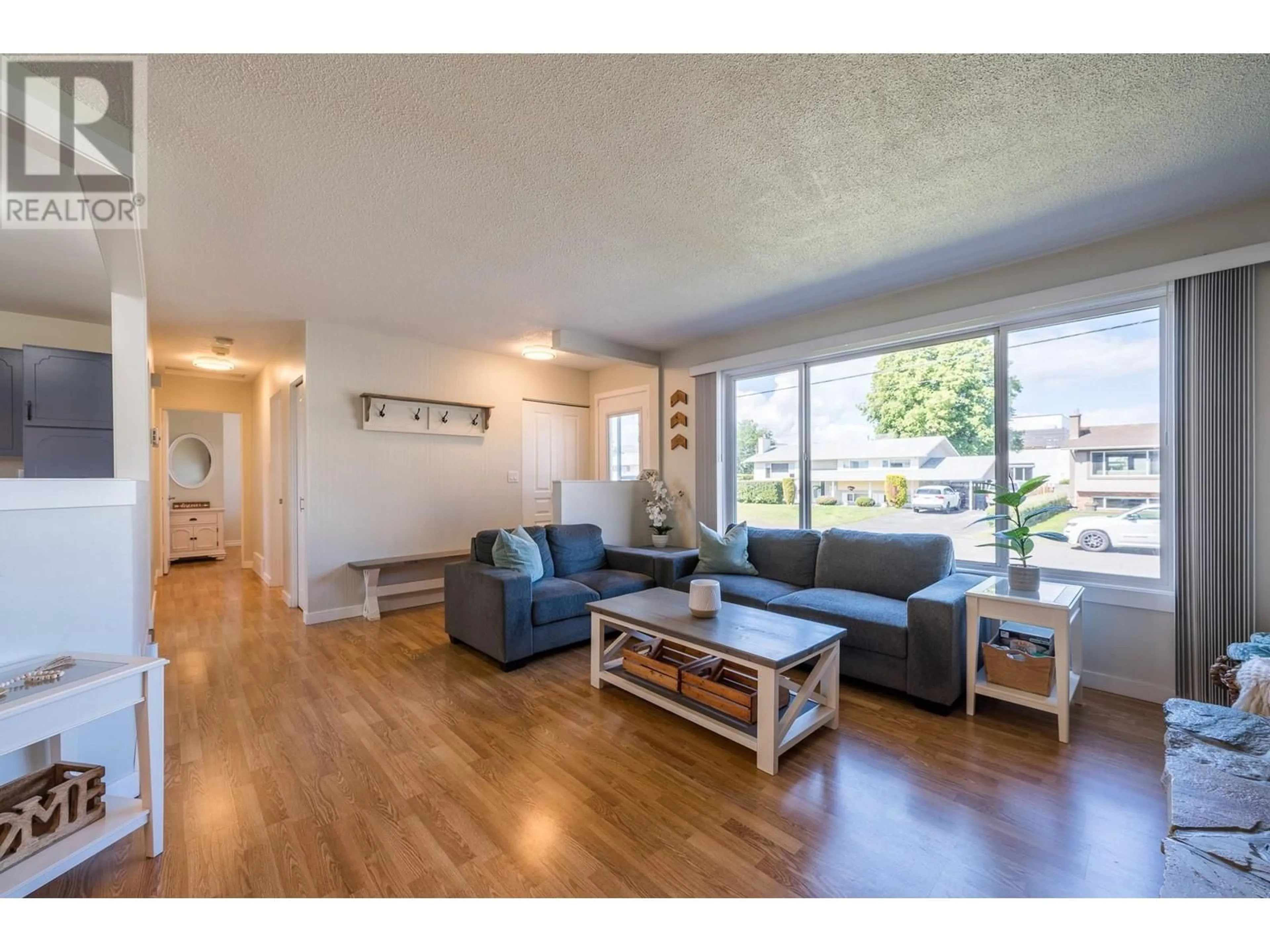 Living room with furniture, wood/laminate floor for 1139 CHATEAU STREET, Kamloops British Columbia V2B5R3