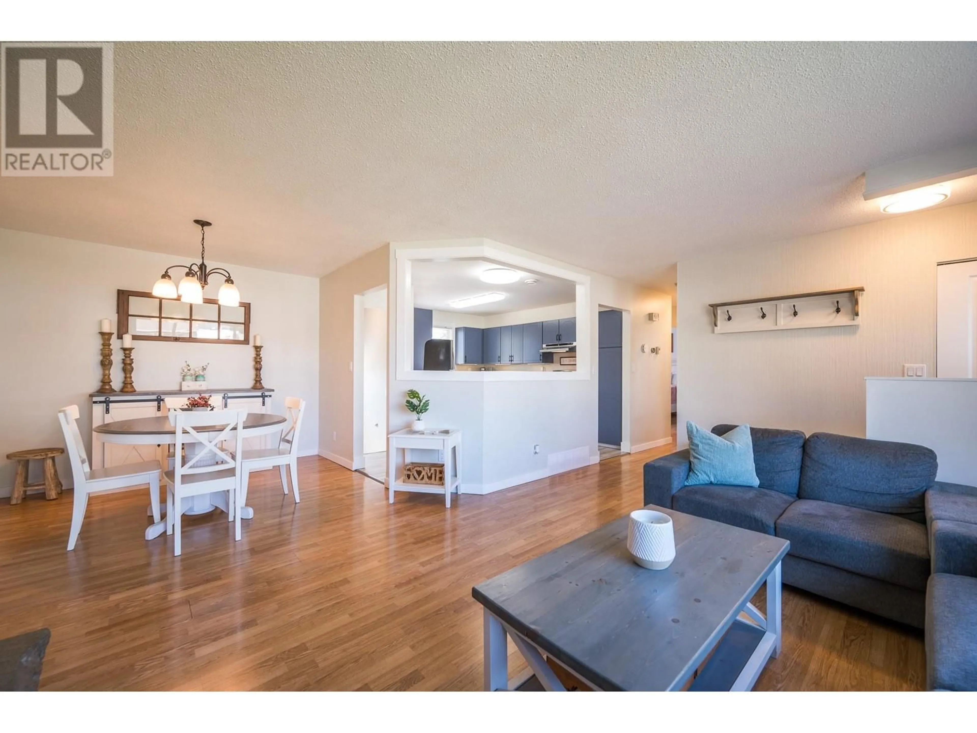 Open concept kitchen, wood/laminate floor for 1139 CHATEAU STREET, Kamloops British Columbia V2B5R3