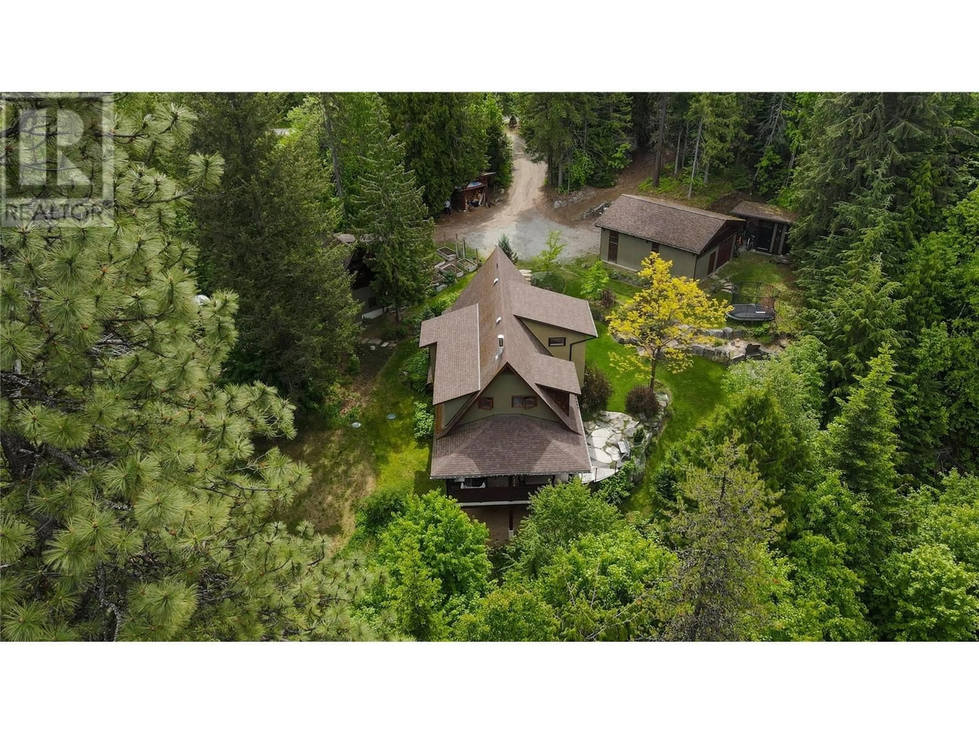 A pic from outside/outdoor area/front of a property/back of a property/a pic from drone, forest/trees view for 3225 VINDUSKY ROAD, Nelson British Columbia V1L6X7