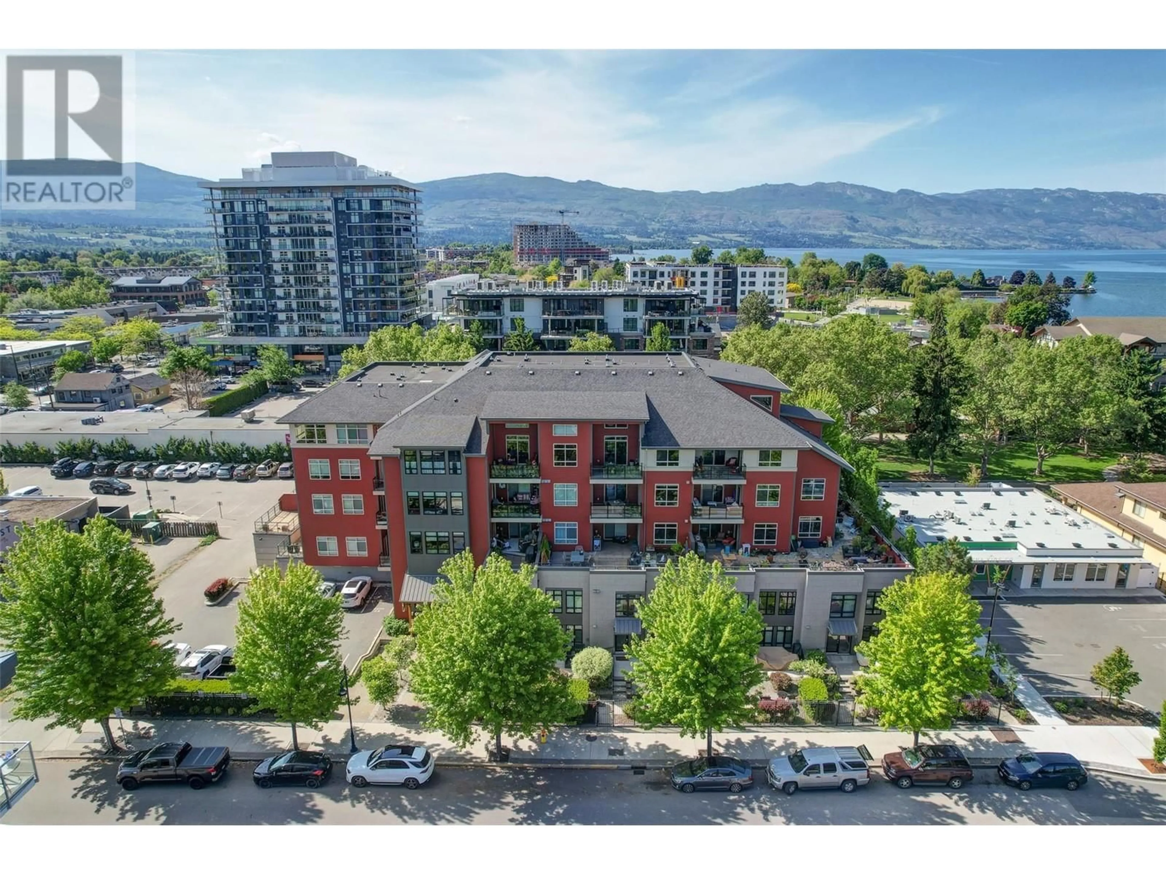 A pic from outside/outdoor area/front of a property/back of a property/a pic from drone, mountain view for 407 - 457 WEST AVENUE, Kelowna British Columbia V1Y4Z3