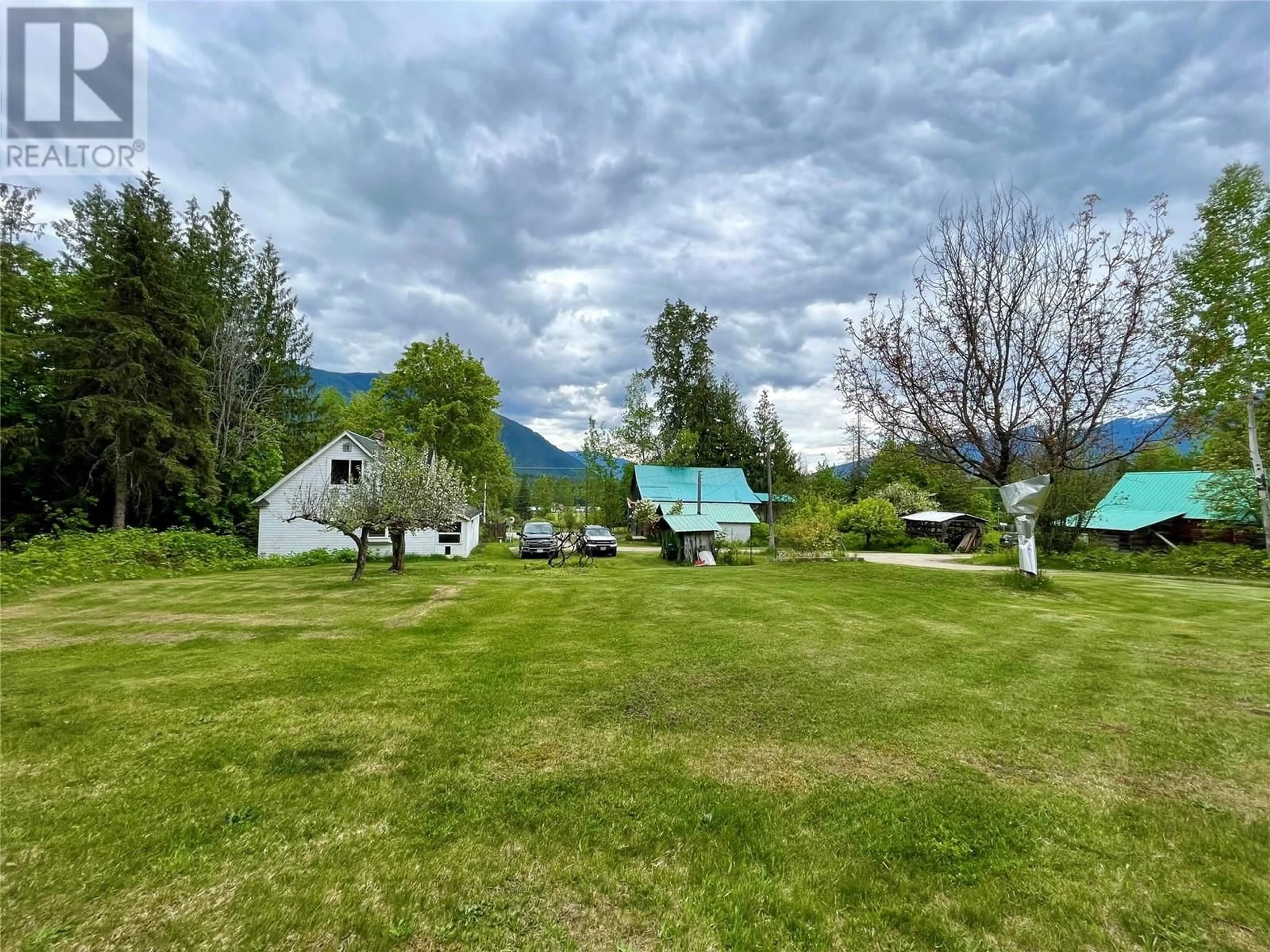 A pic from outside/outdoor area/front of a property/back of a property/a pic from drone, mountain view for 740 HIGHWAY 6 OTHER SOUTH, Nakusp British Columbia V0G1R0